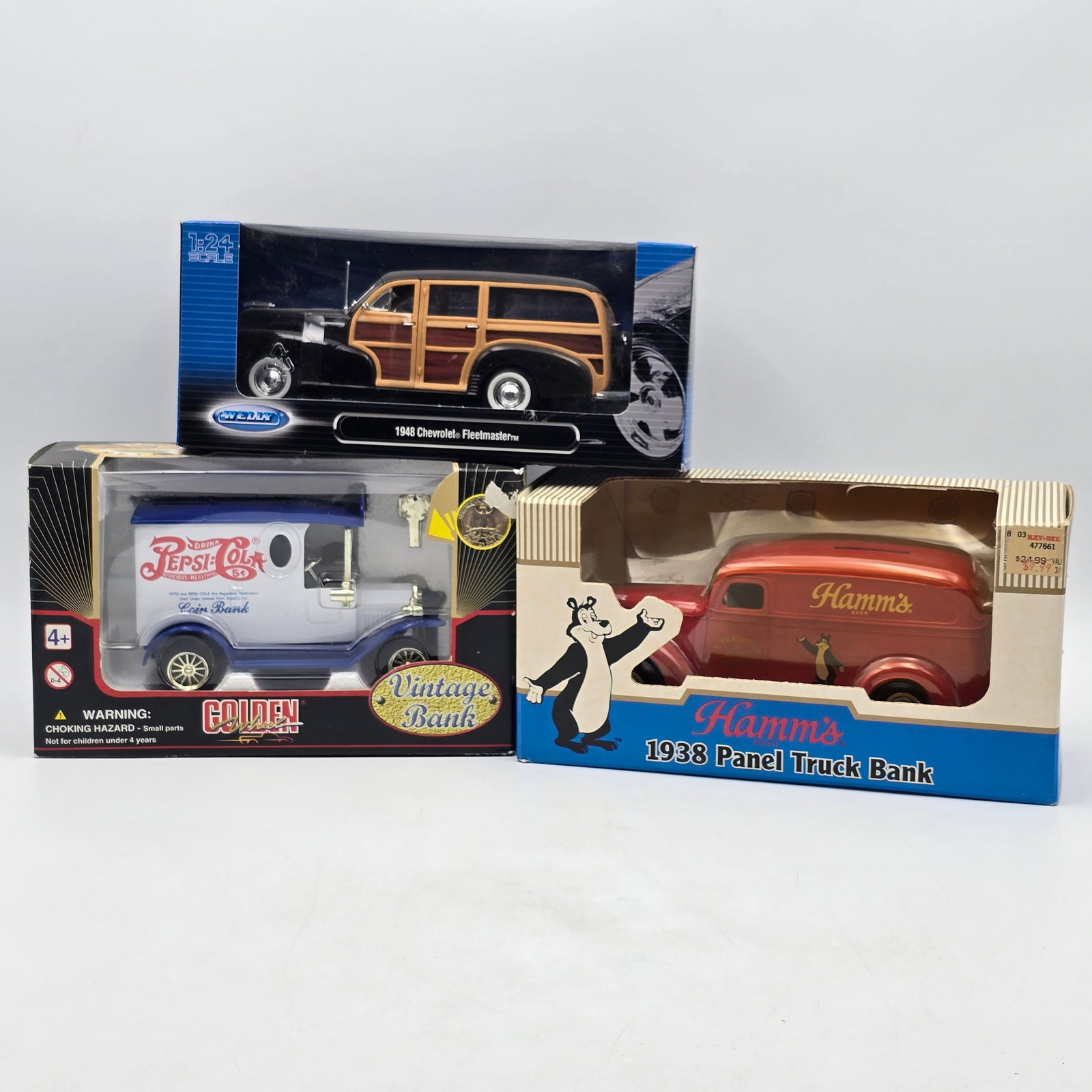 Lot of 3 1:24 Scale Diecast Vehicles: Lot of 3, 1:24 Scale Models All look to be in decent condition, despite some shelf/storage wear. Wellys, Vintage Bank, Ertl Collectibles. Please see photos for more 