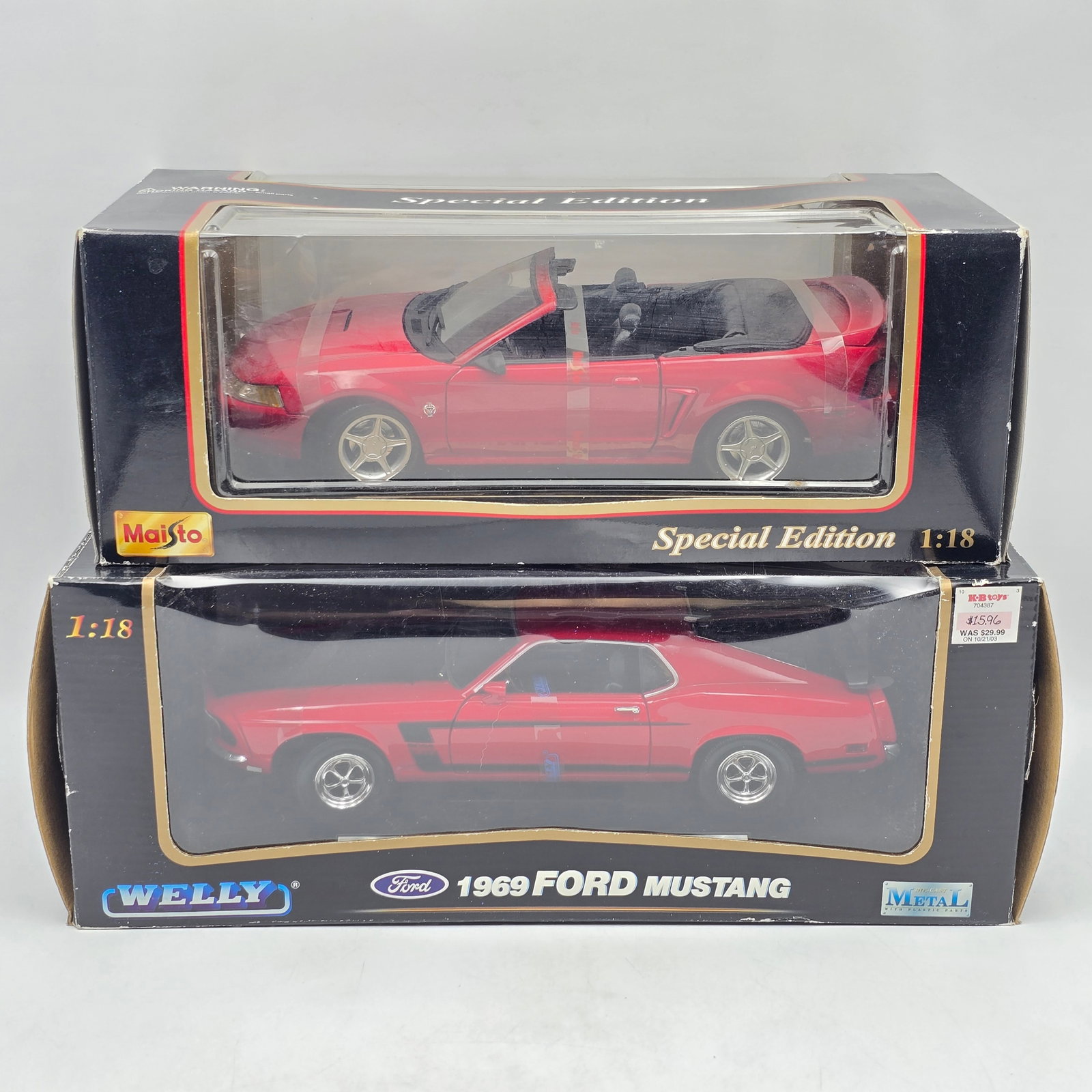 Pair of 1:18 Scale Diecast Models: Pair of Diecast Models , One Maisto and one Welly. 1- 1969 Ford Mustang (red) 1- 1999 Mustang GT (red) Scale size is 1:18. Boxes do have some shelf/storage wear. Please see photos for