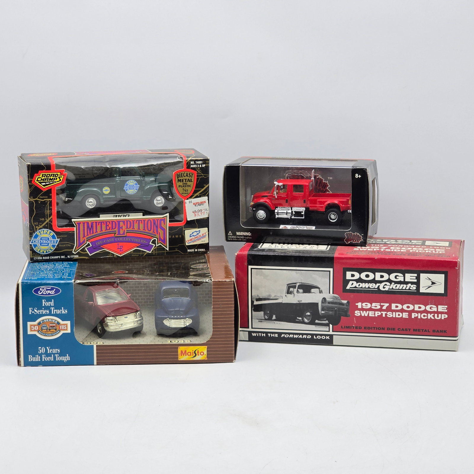 Lot of 4 Assorted Diecast Models: Lot of 4, Assorted Die Cast Models including Road Champs, Maisto and more. All look to be in decent condition with some shelf/storage wear.