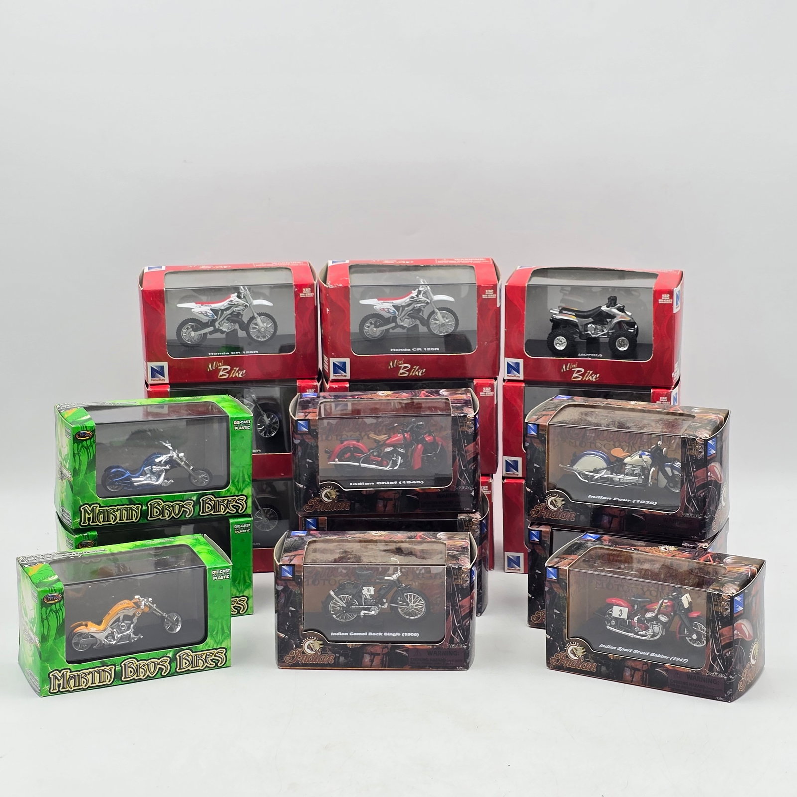 Lot of 18 Assorted Mini Motorcycle Models: Lot of 18 diecast motorcycle models from various series. Includes a mix of cruiser-style bikes, choppers, and custom motorcycles in different finishes and designs. A good variety of styles across the 