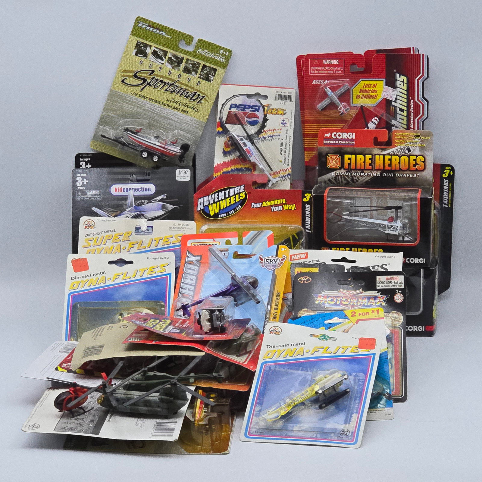 Diecast Helicopter Lot of 36: Lot of 36 diecast helicopter models from various brands and series. Includes a wide mix of military, rescue, and civilian-style helicopters in different scales and packaging types. Nice variety of col