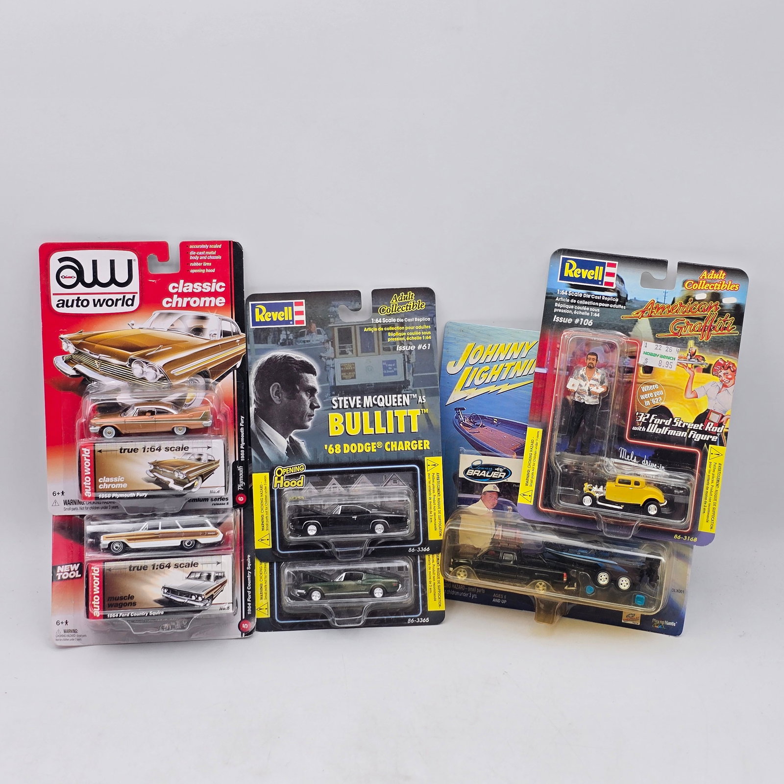 Diecast Classics Lot of 6 Revell & Johnny Lightning: Lot of 6 diecast vehicles from various collectible lines. Includes Auto World Classic Chrome pieces, Revell diecast models, a Johnny Lightning release, and a Steve McQueen Bullitt â€™68 Dodge 