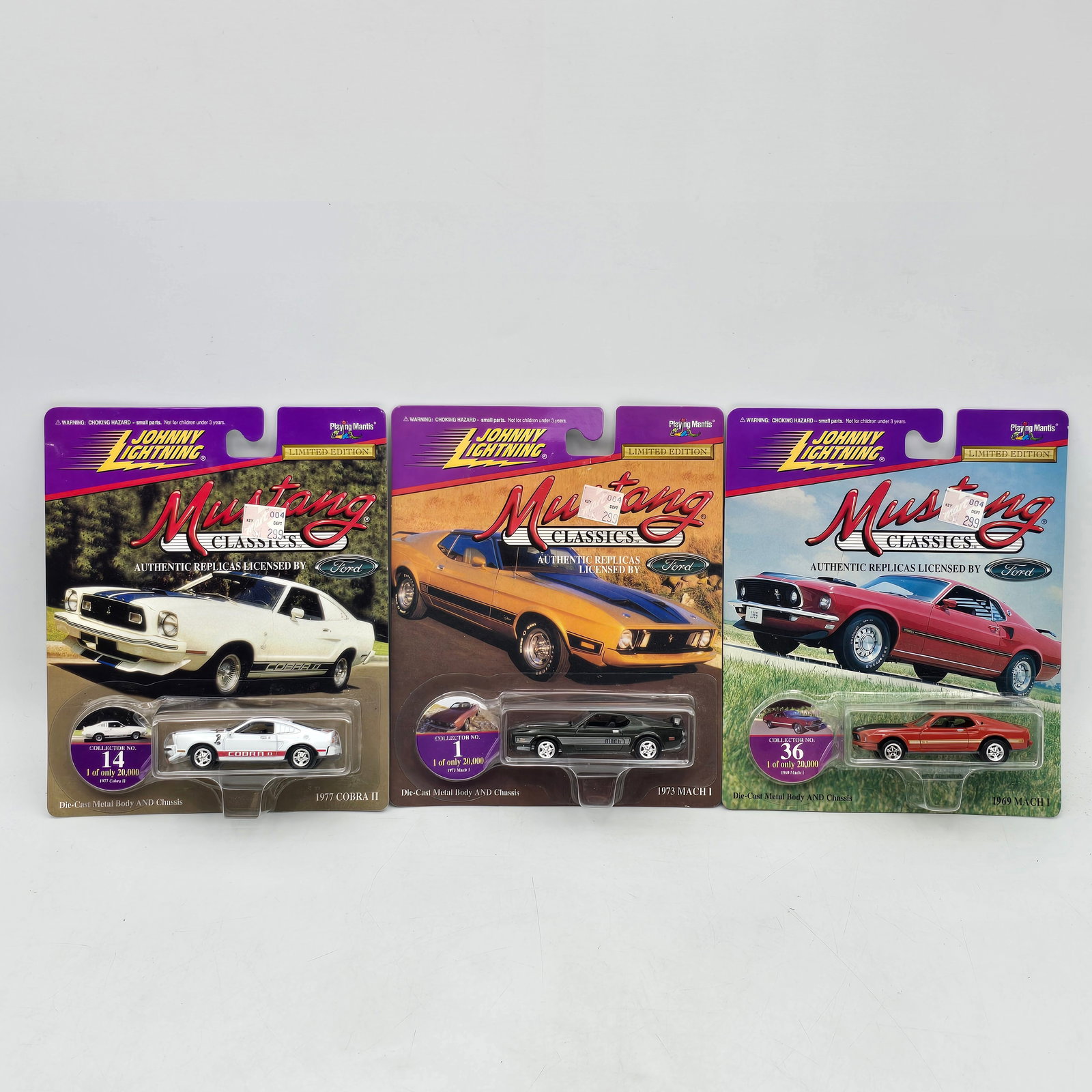 Lot of 3 Johnny Lightning Mustang Car Models: Lot of 3 Johnny Lightning Mustang Classics Car models. 1- 1977 Cobra ll 1- 1973 MACH l 1- 1969 MACH l All items are unopened in original blister packaging. Cards show