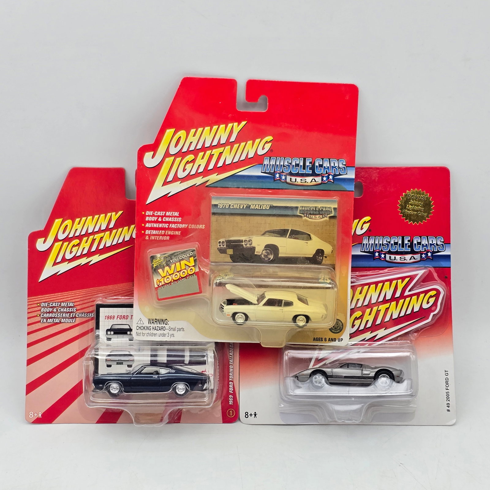 Lot of 3 Johnny Lightning Muscle: Lot of 3 Johnny Lightning Diecast Vehicles including: 1- 1970 Chevy Malibu (Muscle Cars U.S.A.) 2- 1969 Ford Torino Talladega (Muscle Cars 1969 series) 3- 2005 Ford GT (Muscle Cars U.S.A.) A