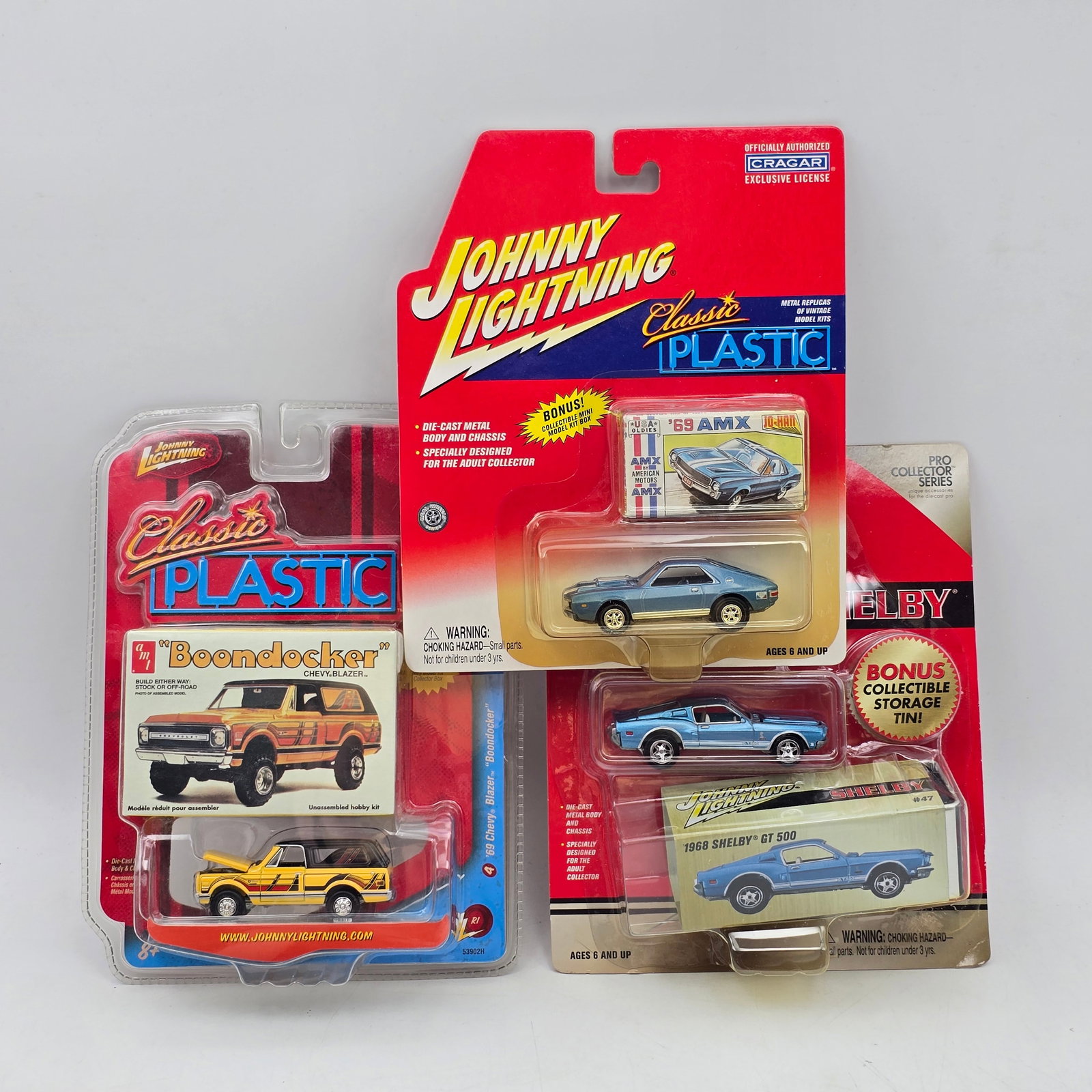 Lot of 3 Johnny Lightning Diecast: Lot of 3 Johnny Lightning Diecast Vehicles including: 1- 1969 AMC AMX (Classic Plastic series) 2- Chevy Blazer â€?Boondockerâ€? (Classic Plastic series) 3- 1968 Shelby GT500 (Shelby series