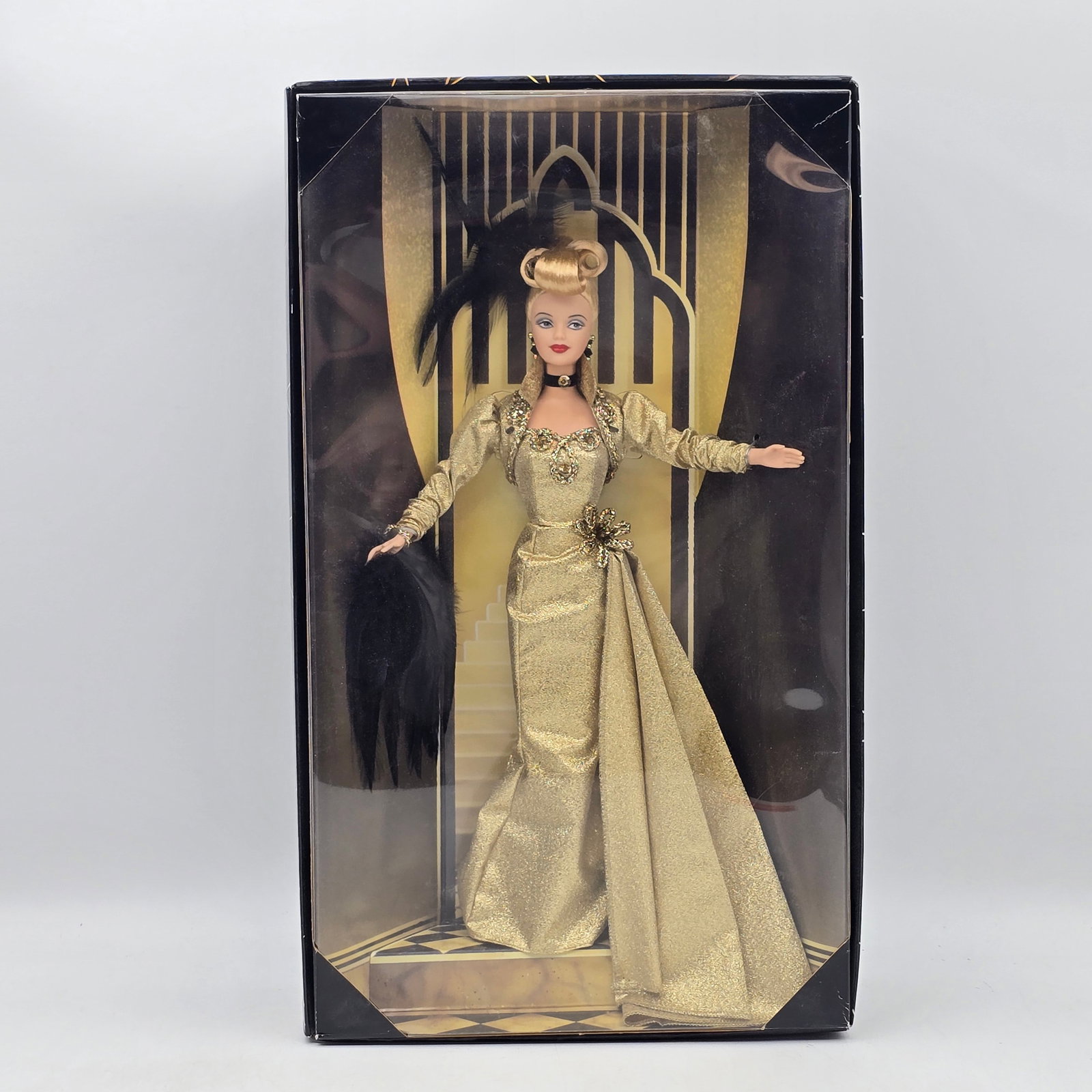 Mattel Golden Hollywood Barbie: Golden Hollywood Barbie, Metro Goldwyn Mayer 75th Anniversary Limited Edition. Commemorates 75 years of MGM films, featuring classic Hollywood styling and themed presentation. Doll is unopened in orig
