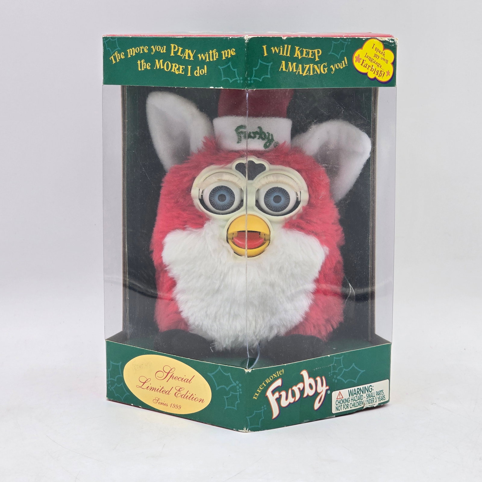 Furby Special Limited Edition Holiday: Furby Holiday Edition electronic toy with original packaging. Features red and white Furby with festive styling and classic interactive design. Packaging has been opened. Furby appears clean with mini