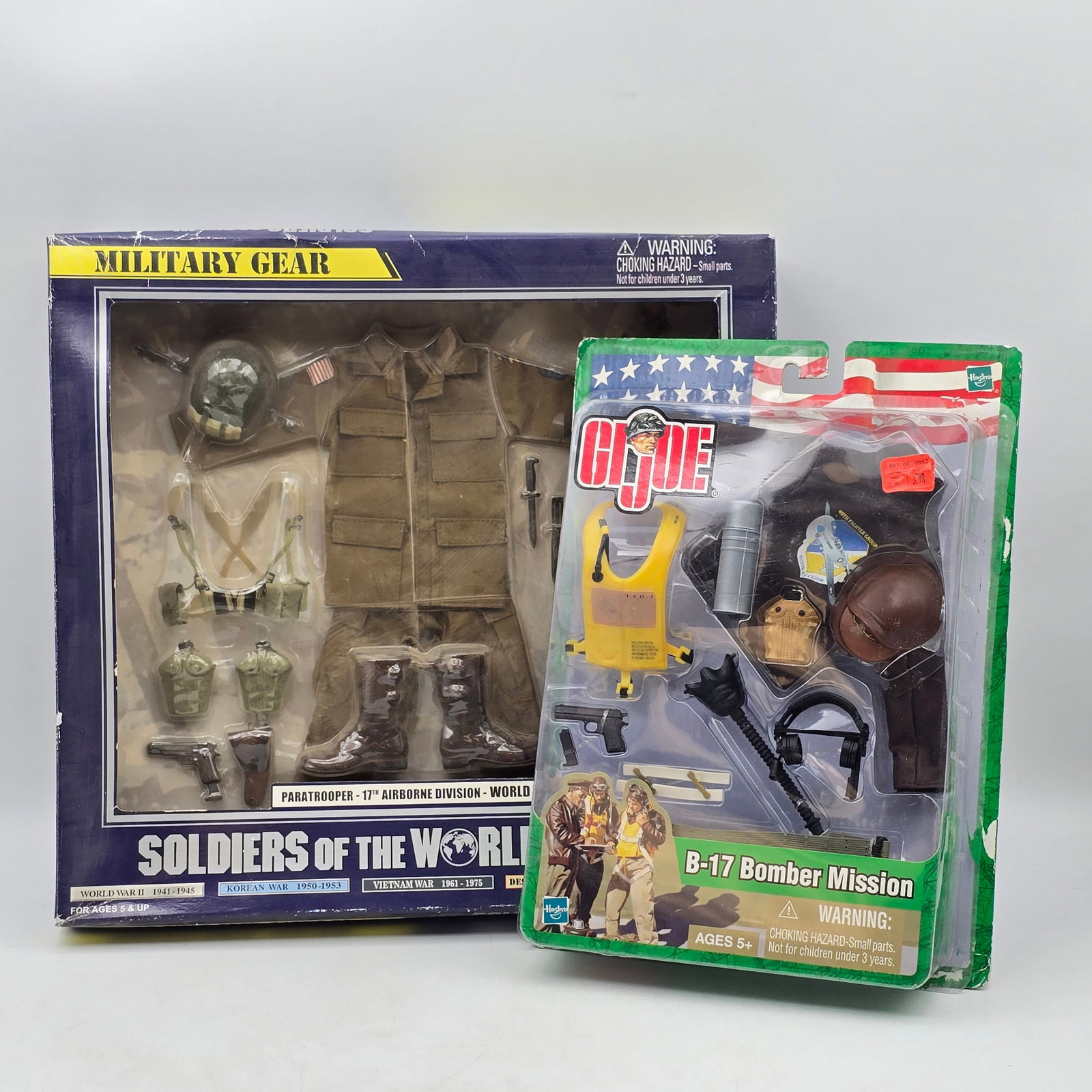Lot of 2 Military Toy Sets: Lot of 2 Military-Themed Toy Sets including: 1- Soldiers of the World â€?Military Gearâ€? Paratrooper Set (with uniform and accessories) 2- G.I. Joe â€?B-17 Bomber Missionâ€? A