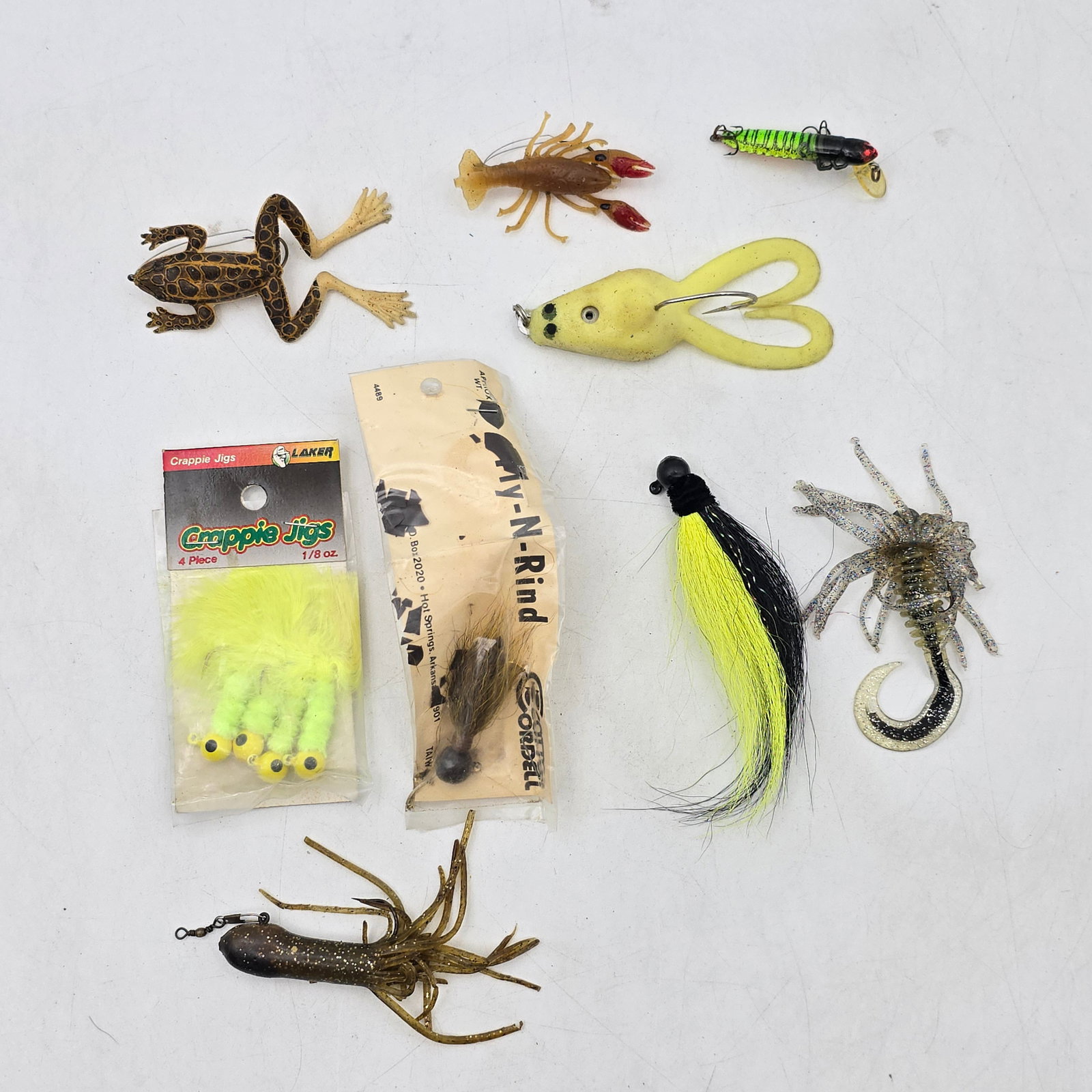 Fishing Lures Mixed Lot 9pc: Mixed Lot of 9 Fishing Lures. Includes a variety of soft plastic creatures, frogs, jigs, and rigged lures in multiple colors and styles. Features both loose items and some packaged pieces. Condition
