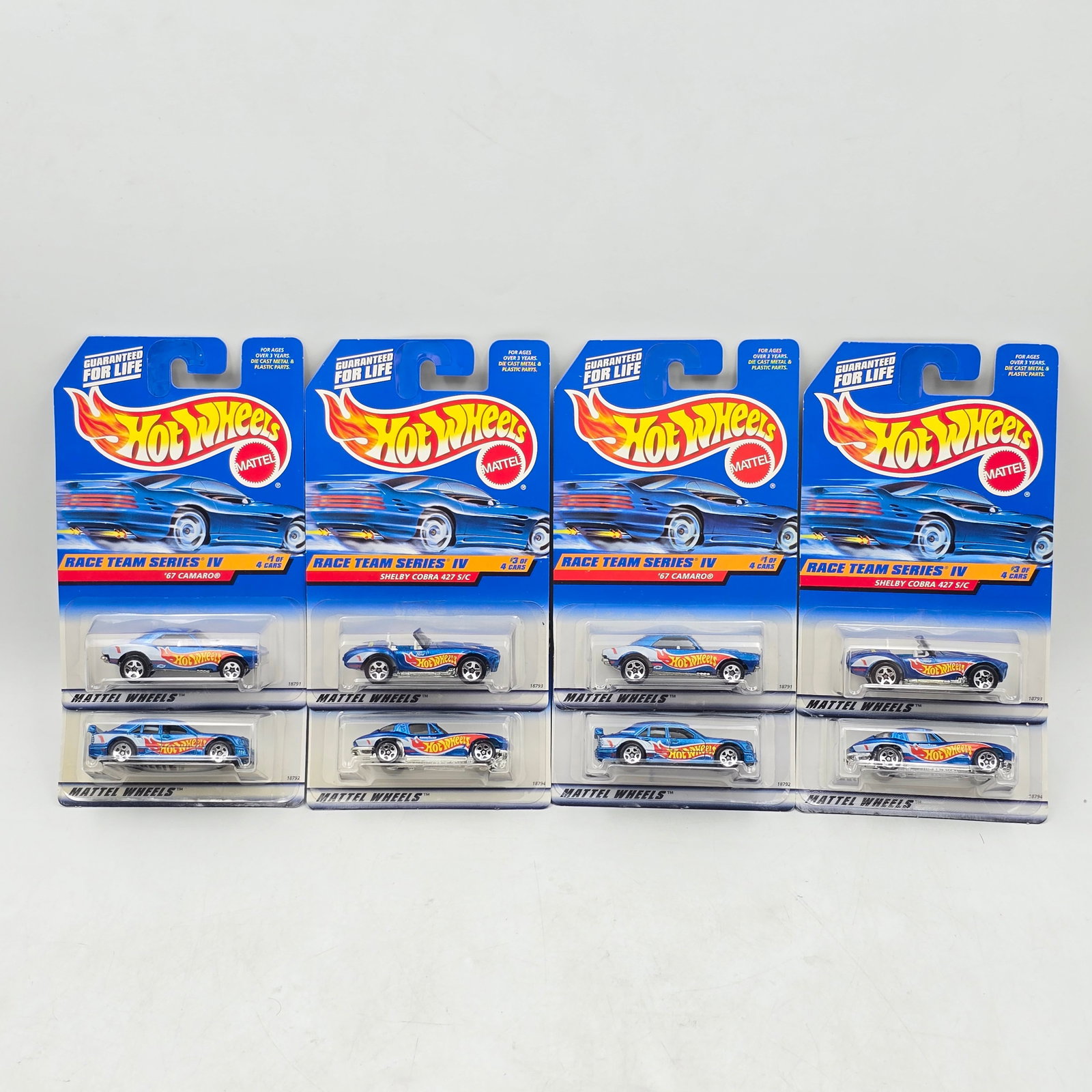 Pair of 90s Hot Wheels Sets: Lot of 8 Hot Wheels Diecast Vehicles from the Race Team Series IV including: 1- â€™67 Camaro (x2) 2- Mercedes C-Class (x2) 3- Shelby Cobra 427 S/C (x2) 4- â€™63 Corvette (x2)