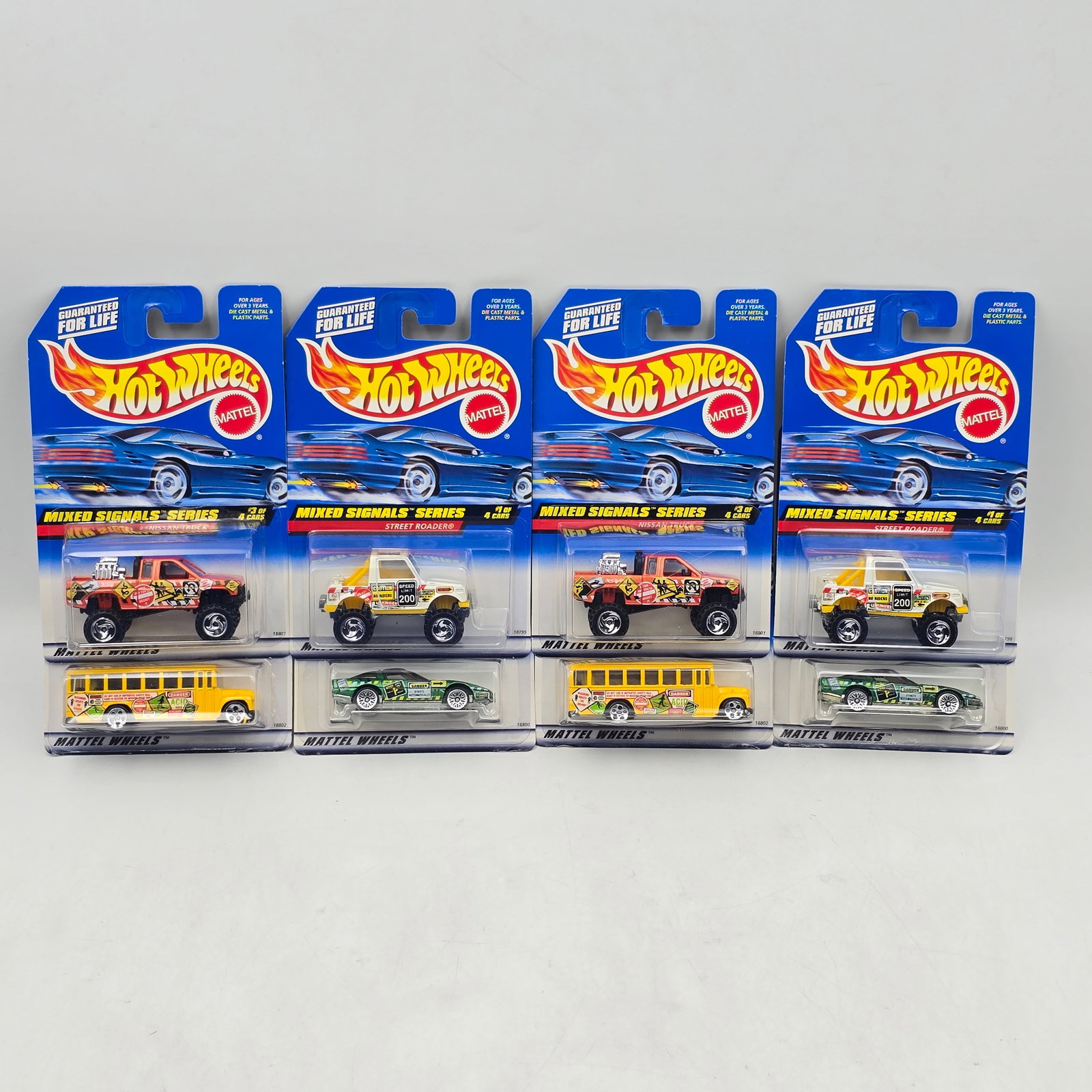 Hot Wheels Mixed Signals Lot of 8: Lot of 8 Hot Wheels diecast cars from the Mixed Signals Series (2 complete sets). Includes Street Roader (#733), â€™80s Corvette (#734), Nissan 4x4 Truck (#735), and School Bus (#736), all fea