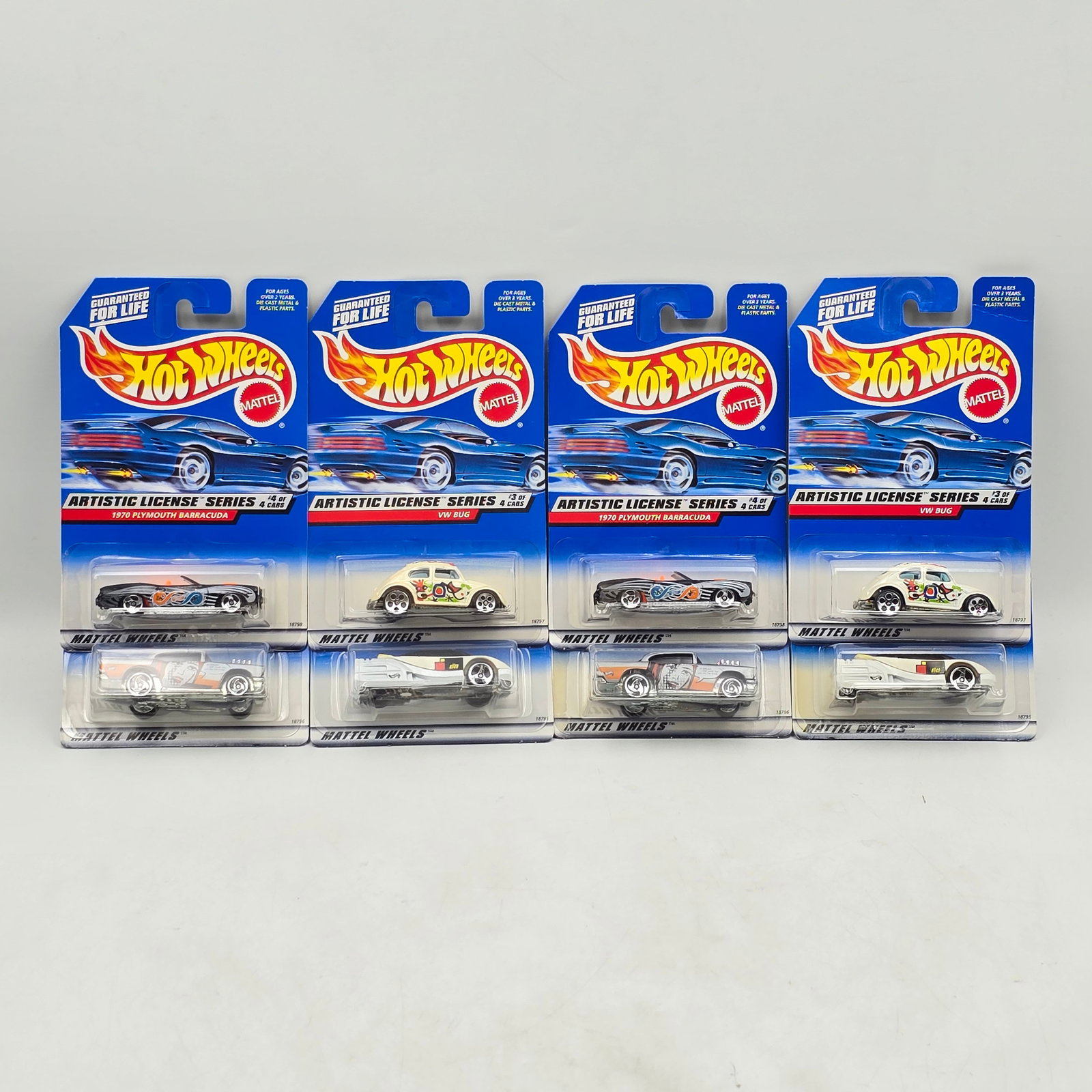 Hot Wheels Artistic License Lot of 8: Lot of 8 Hot Wheels diecast cars from the Artistic License Series (2 complete sets). Includes Alien (#729), â€™57 Chevy (#730), VW Bug (#731), and 1970 Plymouth Barracuda (#732), all featuring
