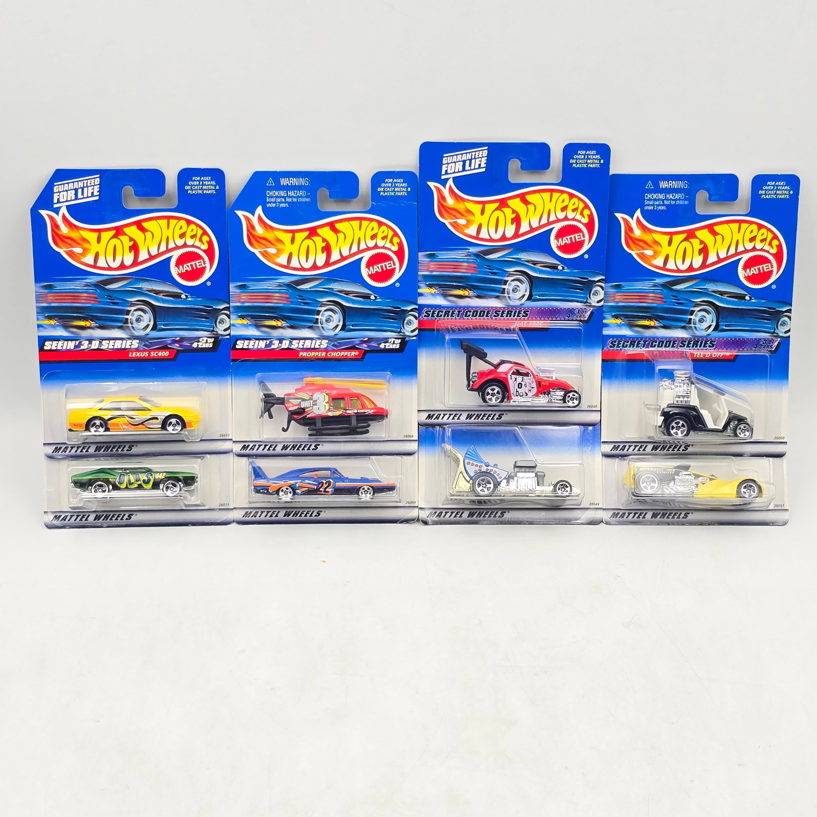 Hot Wheels Seein 3-D Lot of 8: Lot of 8 Hot Wheels diecast cars from the Seeinâ€™ 3-D Series (2 complete sets). Includes Propper Chopper, 1970 Dodge Charger Daytona, Lexus SC400, and Olds 442, all featuring bold graphics an