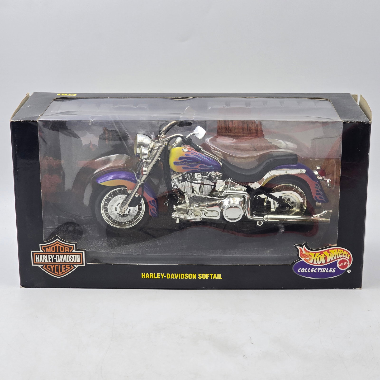 Hot Wheels Harley-Davidson: Hot Wheels Collectibles 1:10 Scale Harley-Davidson Softail Motorcycle. Model features detailed diecast construction with chrome accents and custom flame graphics. Item is new in original box. Produced