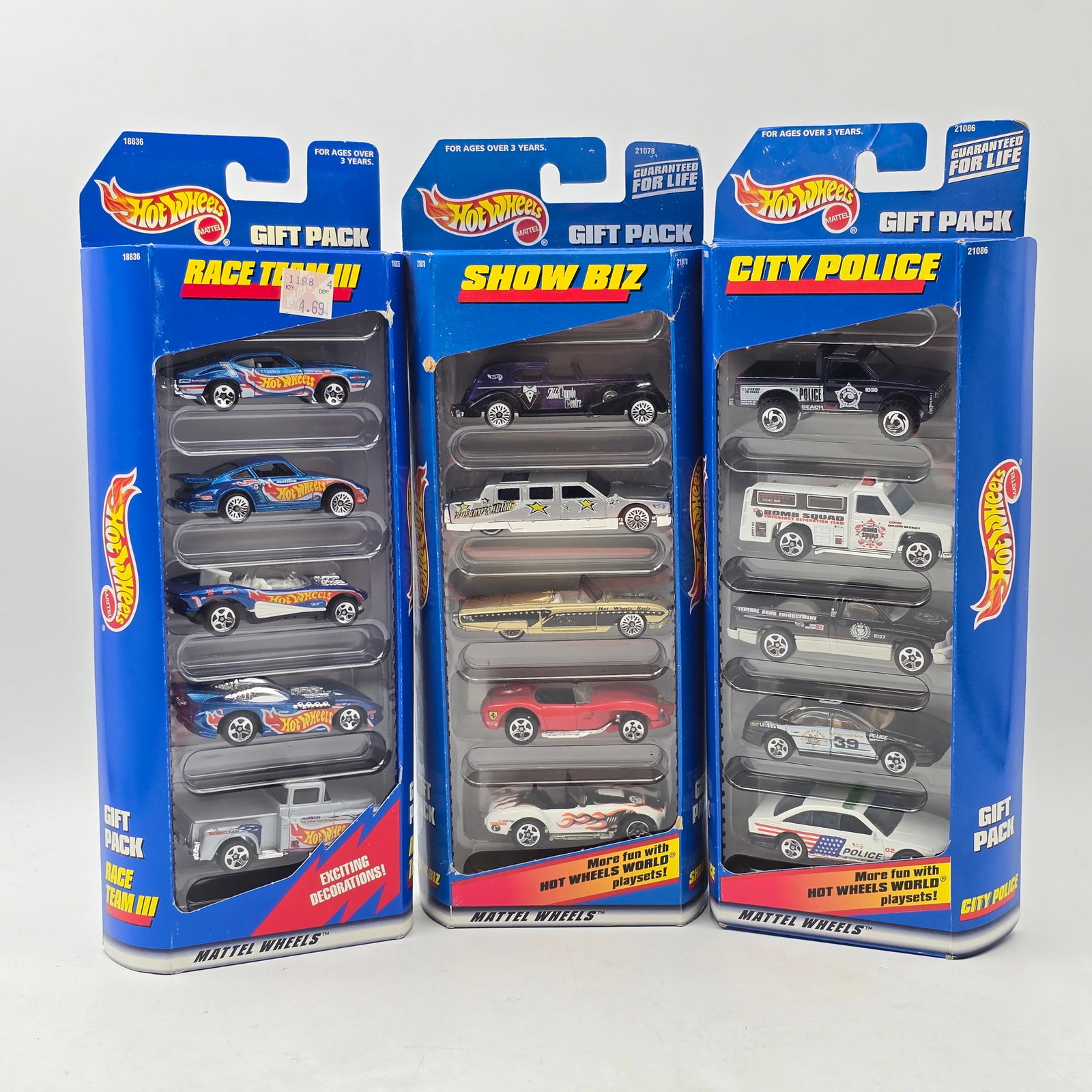 Hot Wheels 5 Pack Lot of 3: Lot of 3 Hot Wheels 5-Packs. Includes themed sets such as Race Team III, City Police, and Show Biz. Each pack contains 5 vehicles for a total of 15 cars. All items are in original packaging.