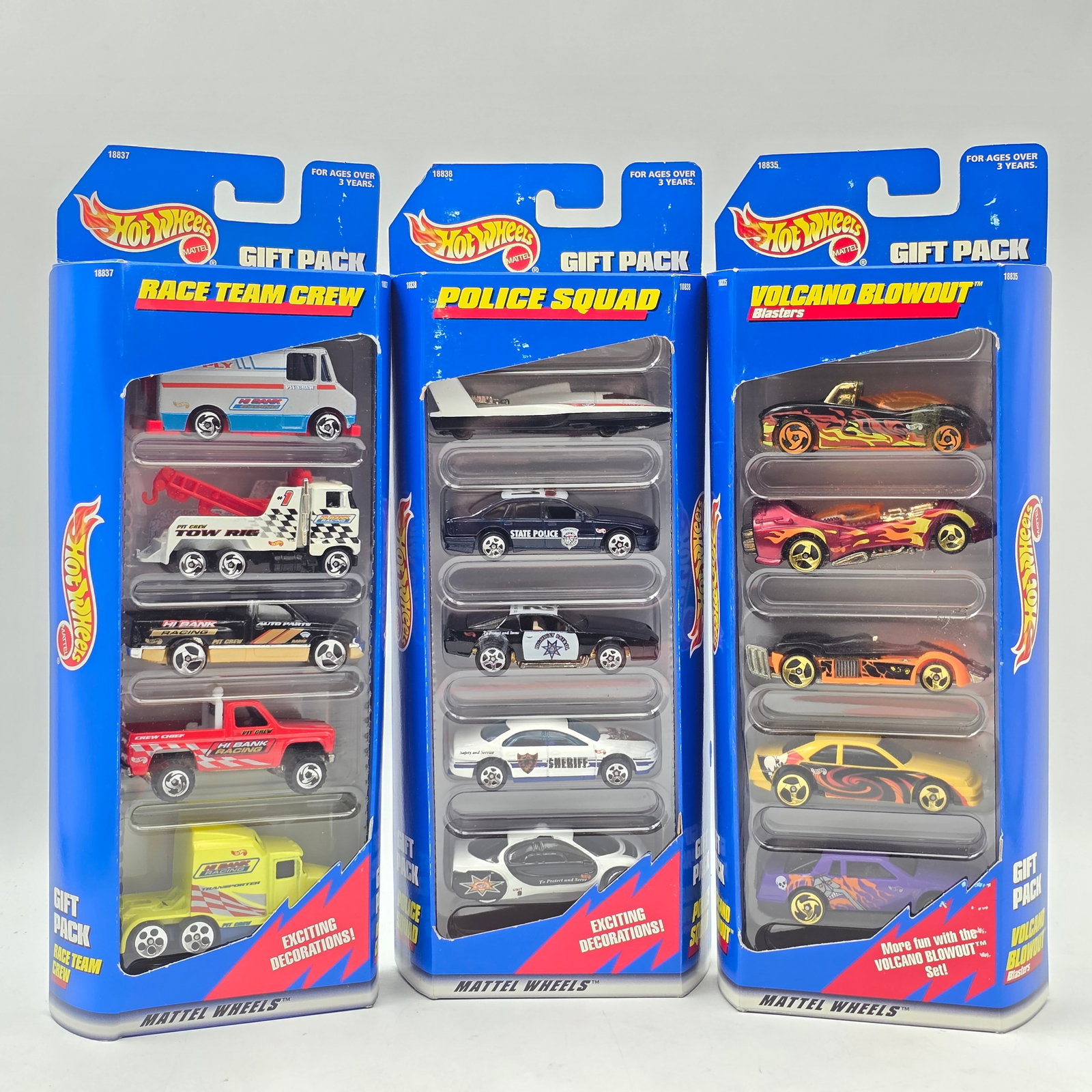 Hot Wheels 5 Pack Lot of 3: Lot of 3 Hot Wheels 5-Packs. Includes themed sets such as Race Team Crew, Police Squad, and Volcano Blowout. Each pack contains 5 vehicles for a total of 15 cars. All items are in original packaging.