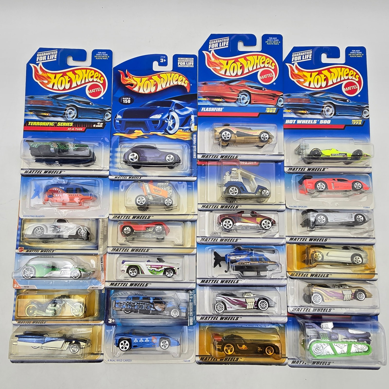 Lot of 24 Hot Wheels Diecast Models Mixed: Collection of 24 Hot Wheels diecast vehicles from late 1990s to early 2000s releases, featuring a wide mix of fantasy castings, concept designs, and select production-style vehicles. Includes pieces f
