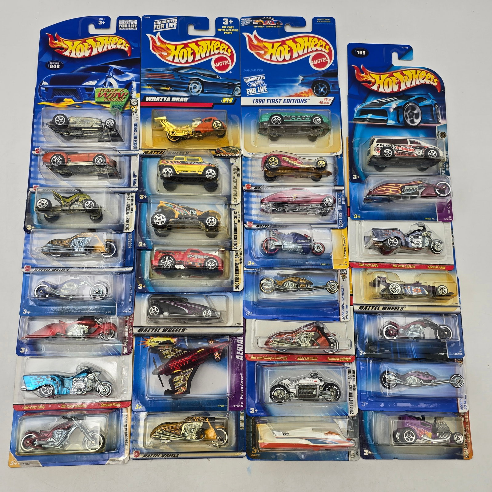 Lot Of 30 Hot Wheels Diecast Motorcycles Mix: Collection of 30 Hot Wheels diecast vehicles with a strong emphasis on motorcycle castings. Features a mix of choppers, sport bikes, and stylized designs, along with a handful of companion vehicles in