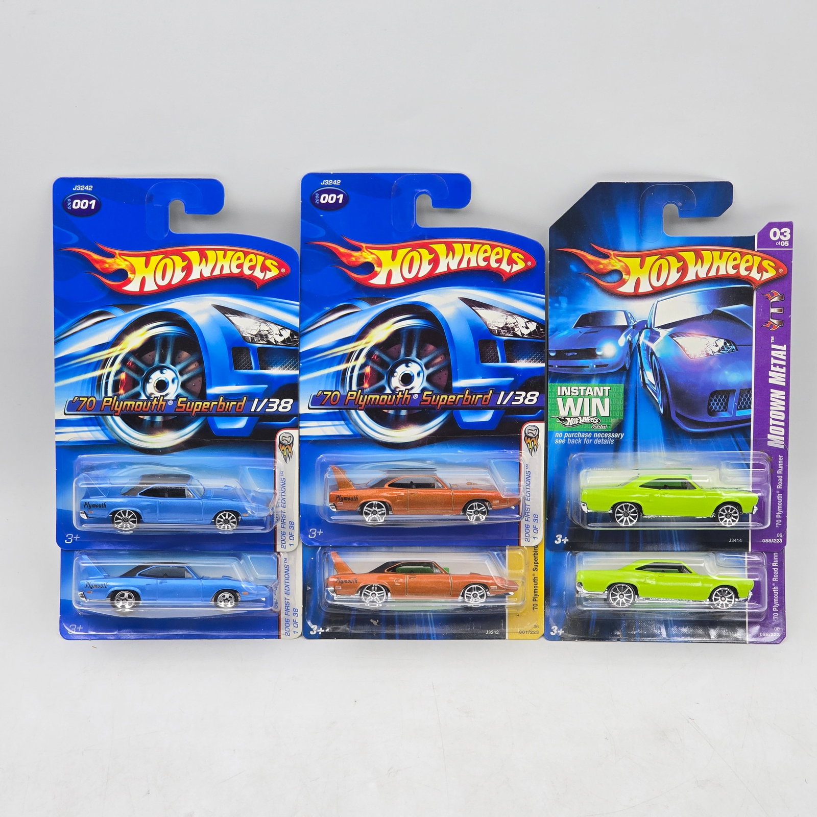 Lot Of 6 Hot Wheels Plymouth Models: Lot of 6 Hot Wheels diecast Plymouth Superbird and Roadrunner castings. Includes multiple examples in blue, orange, and green, showcasing variations in color and presentation. All items are unopened i