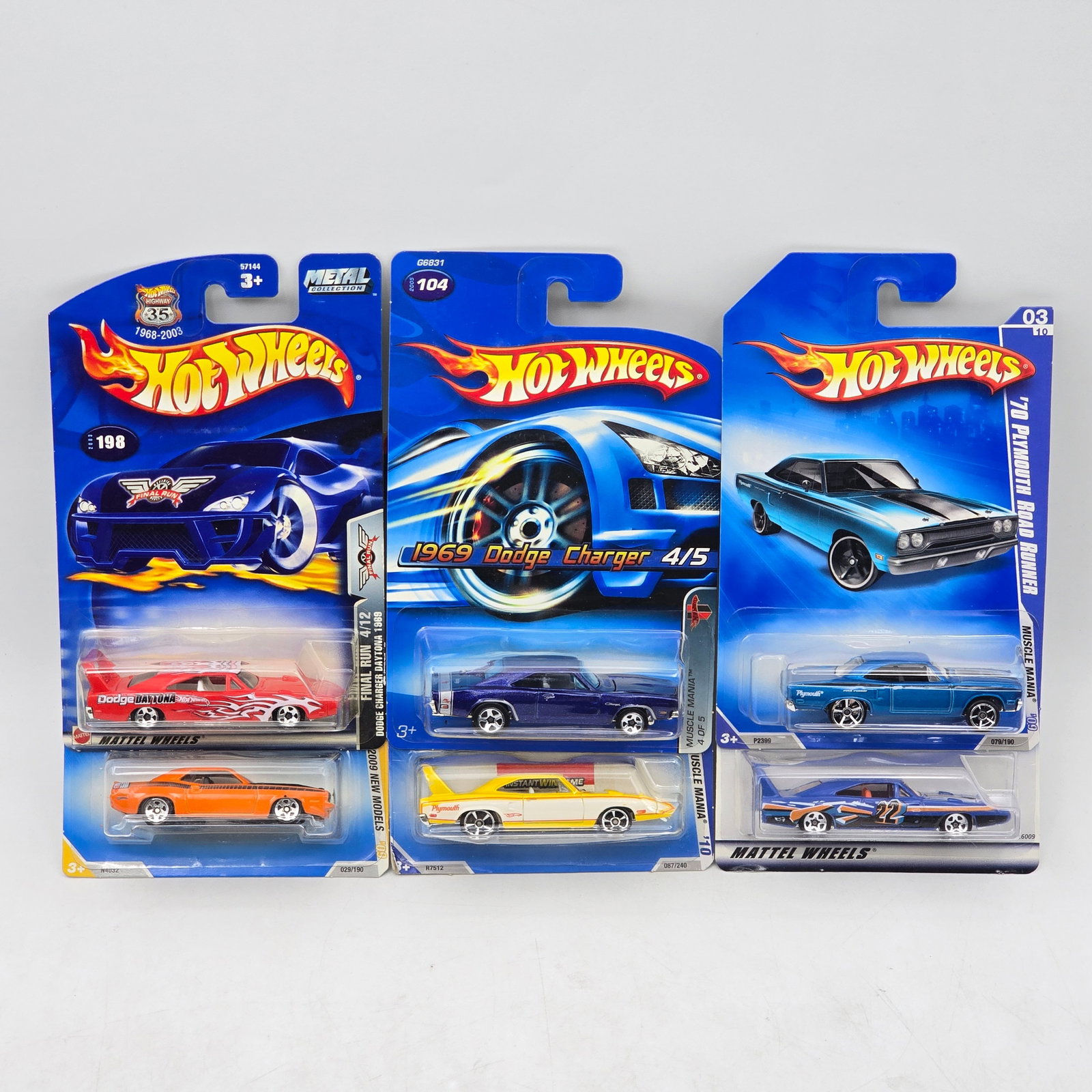 Lot Of 6 Hot Wheels Muscle Cars: Lot of 6 Hot Wheels diecast muscle car castings. Includes Dodge Charger, Plymouth Road Runner, and similar classic-era models in a mix of bold colors and racing-style deco. All items are unopened in o