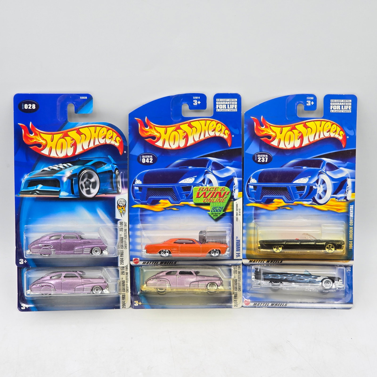 Lot Of 6 Hot Wheels Classic Car Mix: Lot of 6 Hot Wheels diecast vehicles featuring classic car castings. Includes full-size sedans and long-body cruisers, with a mix of vintage-inspired designs in varied colors and finishes. All items a