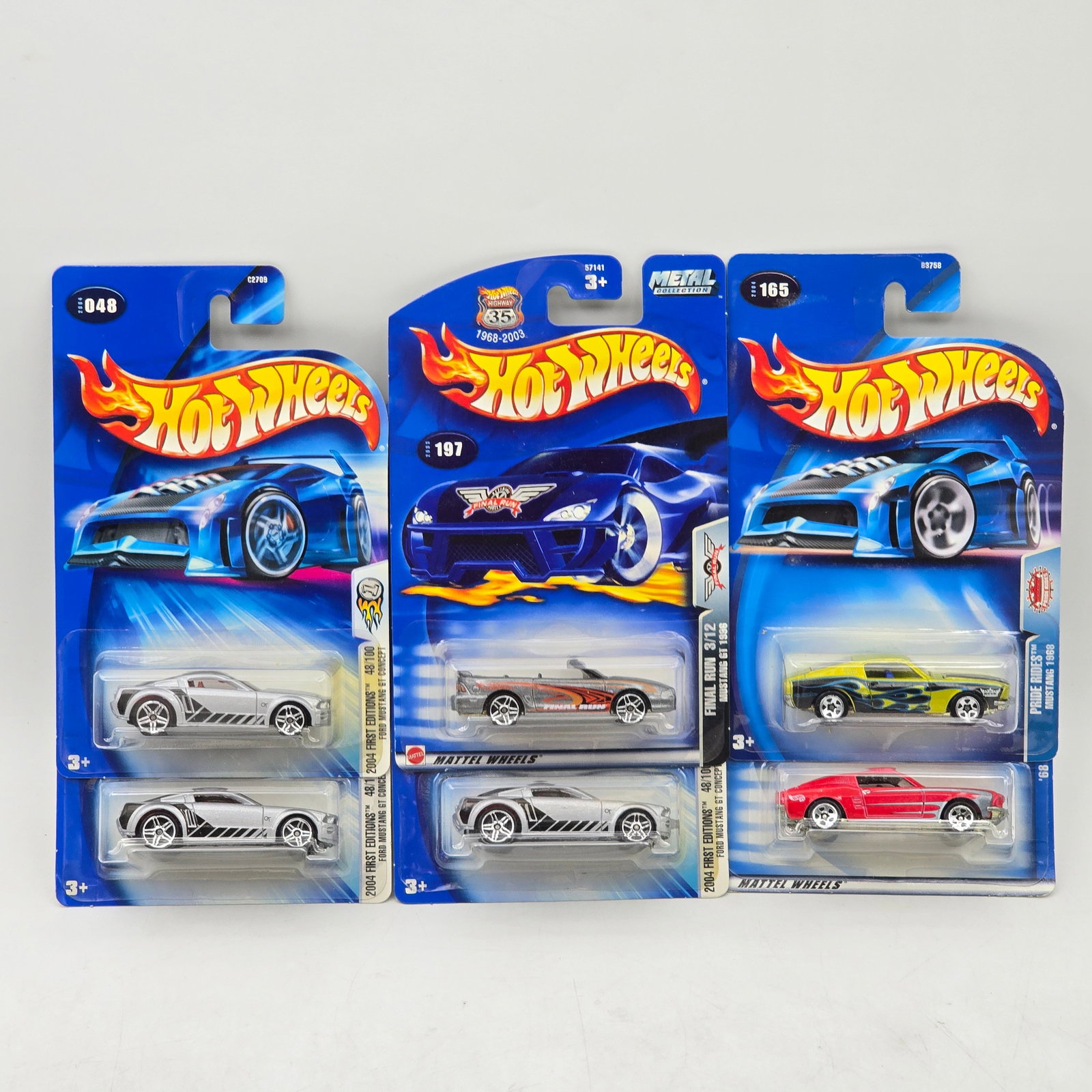 Lot Of 6 Hot Wheels Mustang Models: Lot of 6 Hot Wheels diecast Ford Mustang castings. Includes a mix of modern and classic Mustang designs, with varied colors and stripe/graphic deco across the group. All items are unopened in original