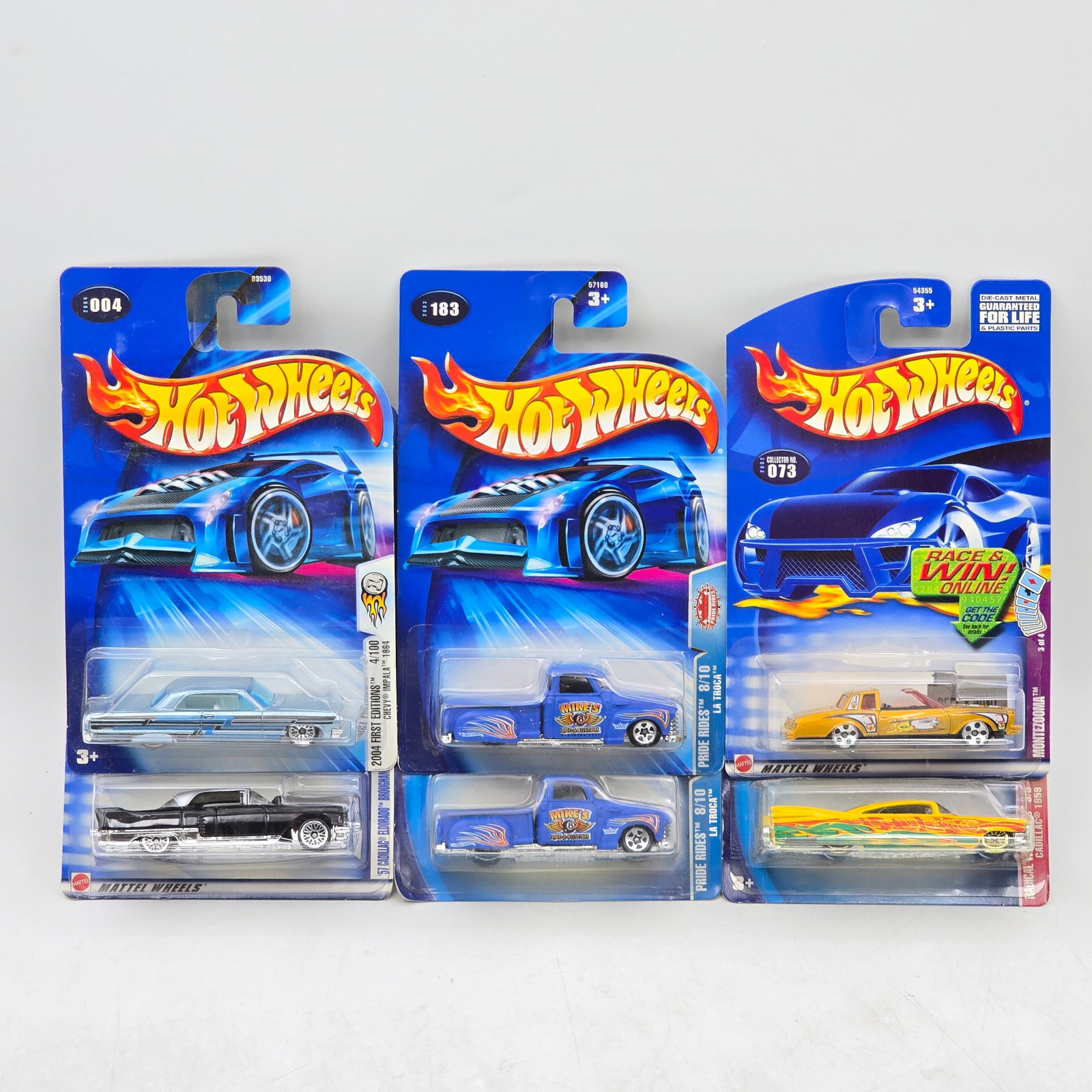 Lot Of 6 Hot Wheels Classic Car & Truck Mix: Lot of 6 Hot Wheels diecast vehicles featuring a mix of classic cars and truck castings. Includes long-body cruisers, a custom pickup, and vintage-inspired designs with varied colors and graphic deco.