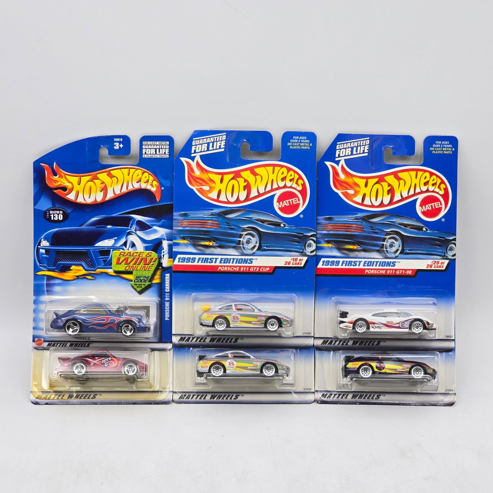 Lot Of 6 Hot Wheels Porsche Models: Lot of 6 Hot Wheels diecast Porsche castings. Includes 911 GT3 Cup and 911 GT1-98 models along with additional racing-inspired variants, featuring detailed deco and performance styling. All items are 