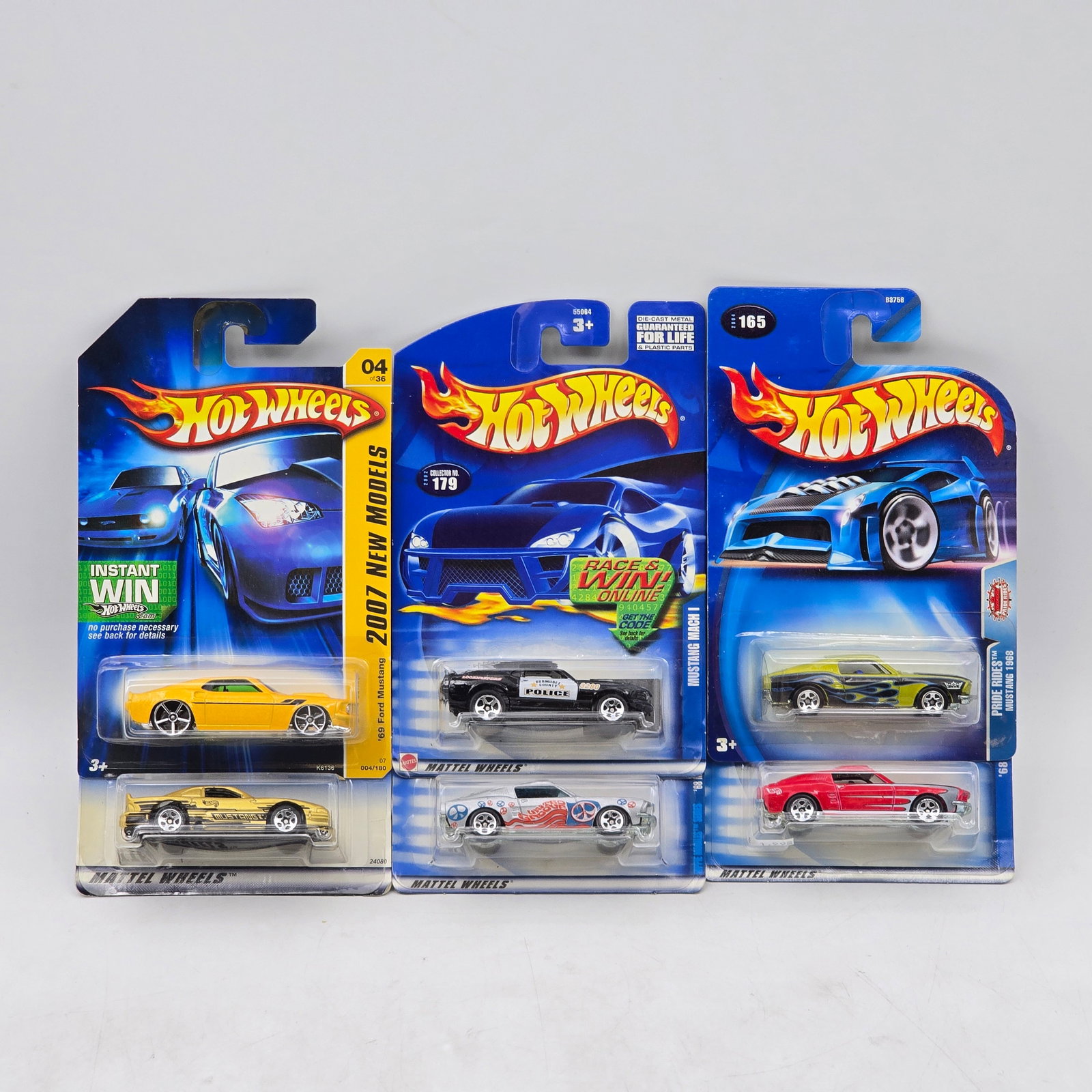 Lot Of 6 Hot Wheels Mustang Models: Lot of 6 Hot Wheels diecast Ford Mustang castings. Includes a mix of classic and modern Mustang designs, featuring varied colors and both clean and graphic deco examples. All items are unopened in ori