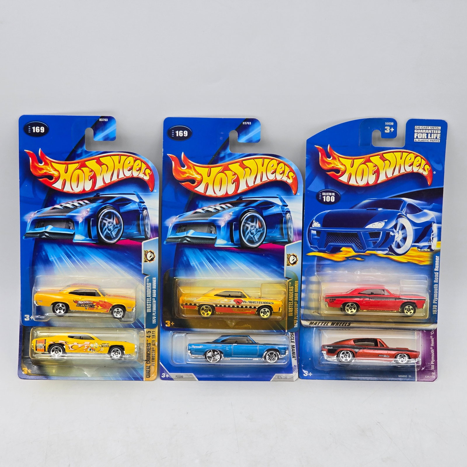 Lot Of 6 Hot Wheels Plymouth Muscle Cars: Lot of 6 Hot Wheels diecast Plymouth castings. Includes Road Runner, Barracuda, and similar muscle-era models in yellow, blue, and red with a mix of clean finishes and graphic deco. All items are unop