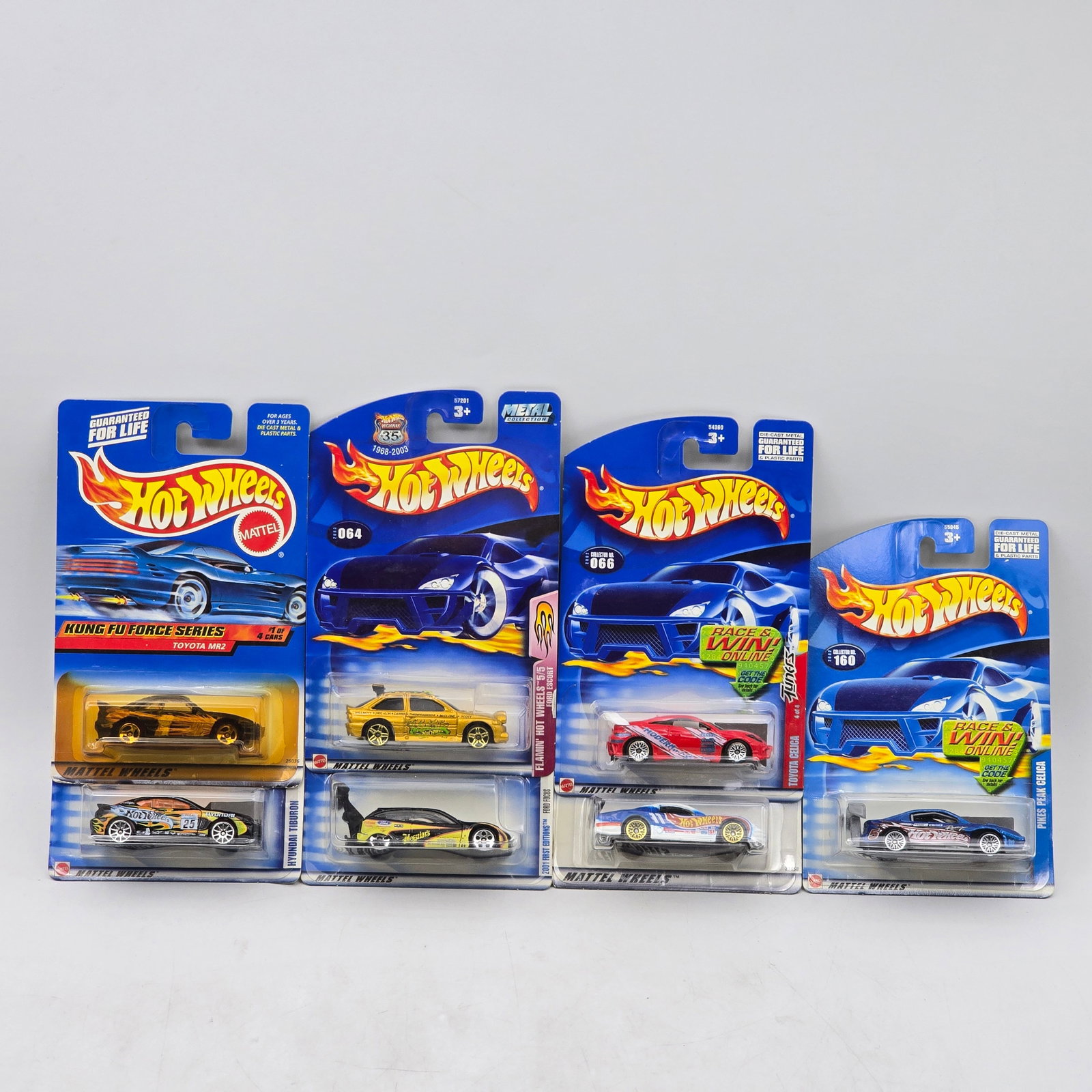 Lot Of 7 Hot Wheels Sports Car Mix: Lot of 7 Hot Wheels diecast vehicles featuring a mix of sports and performance-style castings. Includes a variety of sleek coupes and race-inspired designs in yellow, red, silver, and black with both 