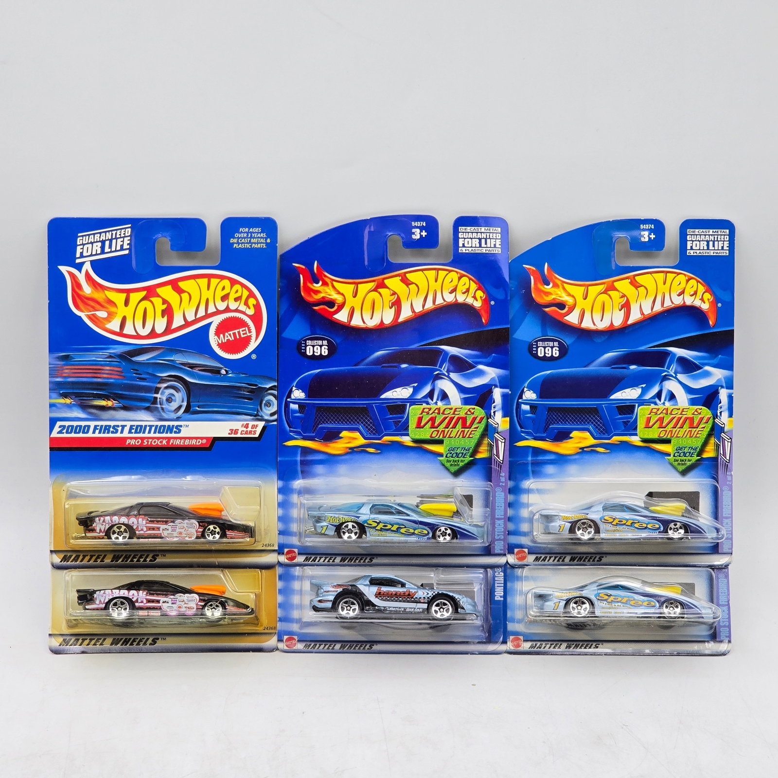 Lot Of 6 Hot Wheels Pro Stock Firebird Models: Lot of 6 Hot Wheels diecast Pro Stock Firebird castings. Includes multiple examples in varied racing liveries such as Spree and other drag-style graphics, with consistent performance styling across th