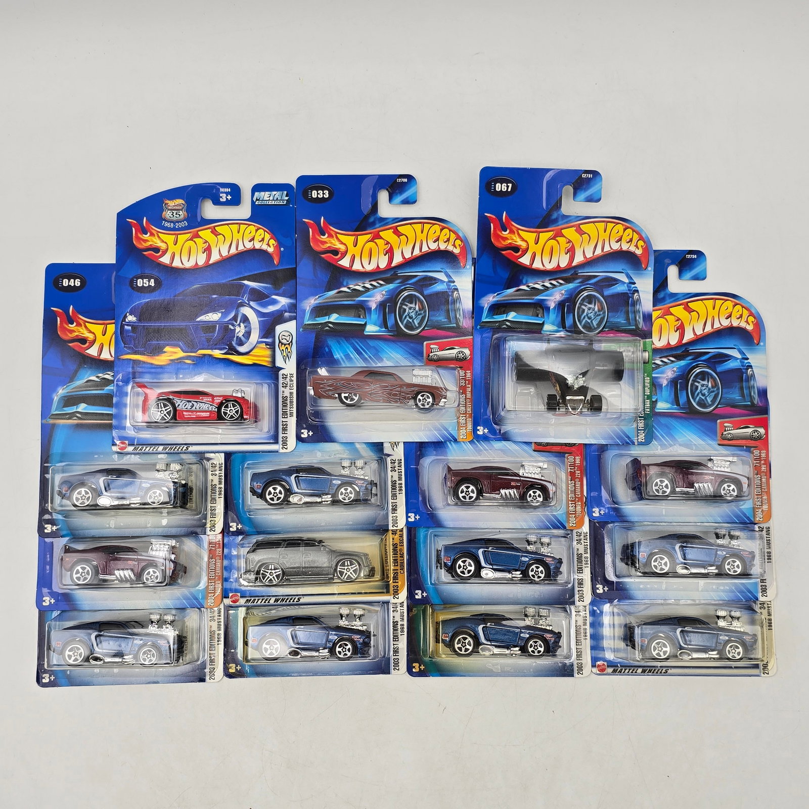 Lot Of 15 Hot Wheels First Editions & Custom Models: Lot of 15 Hot Wheels diecast vehicles featuring a mix of First Editions and custom-style castings. Includes multiple blown-engine designs, hot rods, and performance builds, along with select First Edi