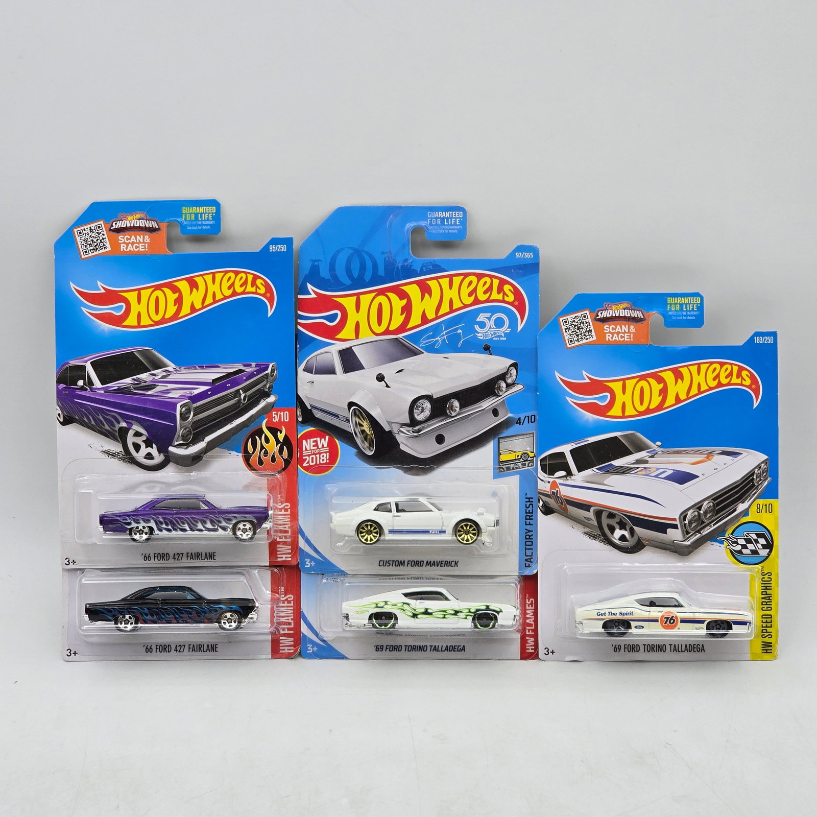 Lot Of 5 Hot Wheels Ford Models: Lot of 5 Hot Wheels diecast Ford castings. Includes â€™66 Ford Fairlane 427, Custom Ford Maverick, and â€™69 Ford Torino Talladega models in purple, white, and blue with a mix of clean