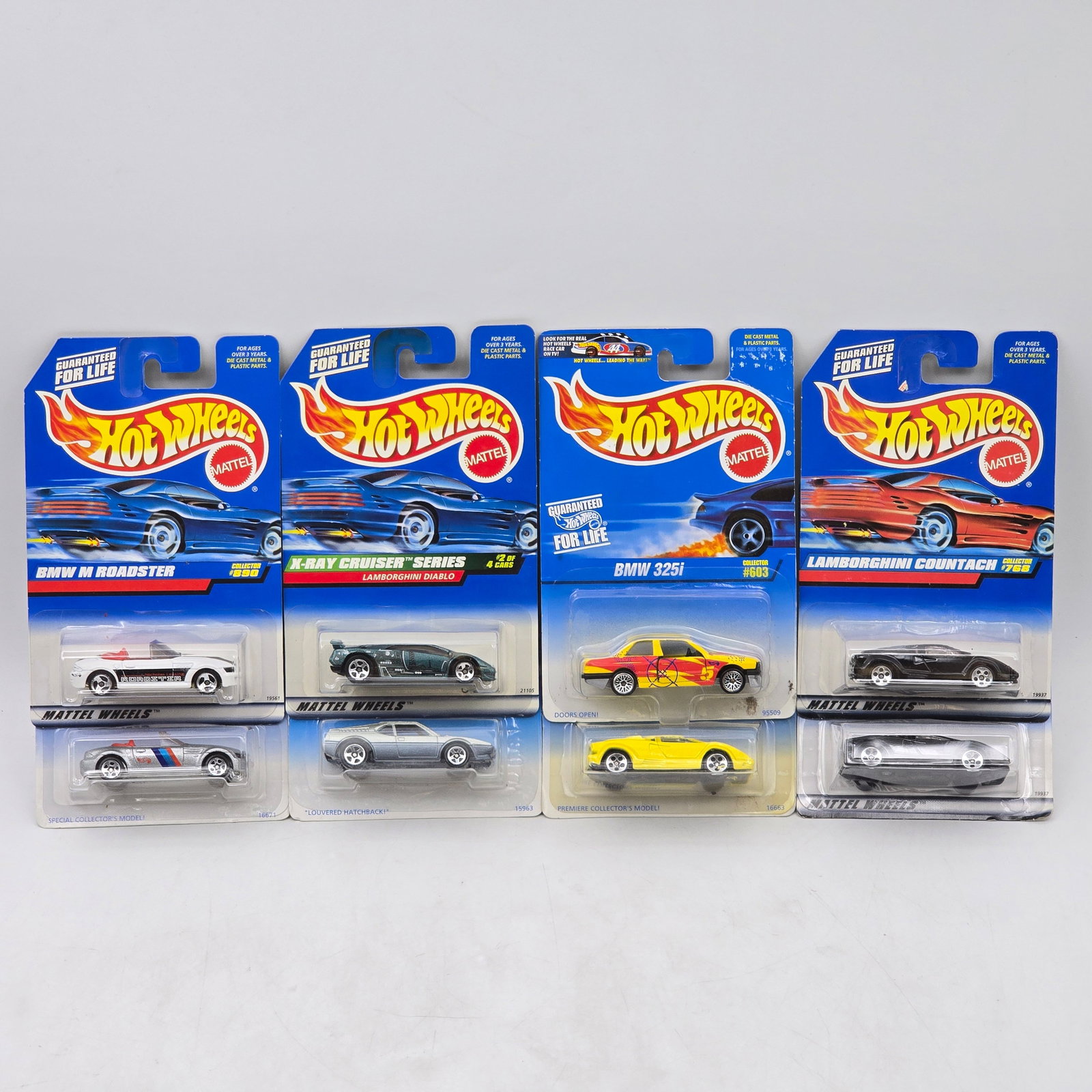 Lot Of 8 Hot Wheels European Models: Lot of 8 Hot Wheels diecast vehicles featuring European marques. Includes BMW M Roadster, BMW 325i, Lamborghini Diablo (X-Ray Cruiser Series), and Lamborghini Countach castings in a mix of factory-sty