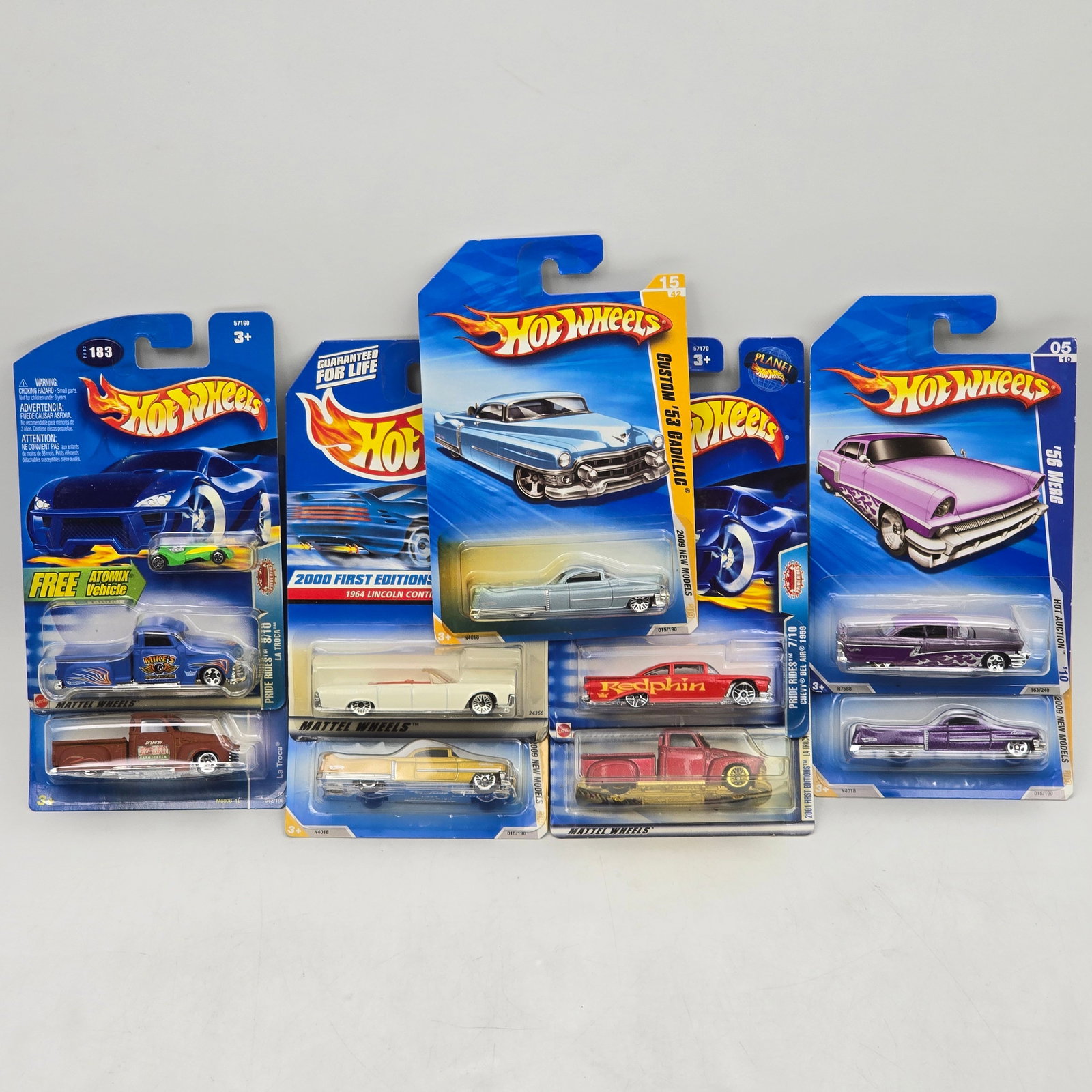 Lot Of 9 Hot Wheels Custom & Classic Models: Lot of 9 Hot Wheels diecast vehicles featuring a mix of classic American and custom-style castings. Includes Custom â€™53 Cadillac, â€™56 Ford, and other vintage-inspired models in blu