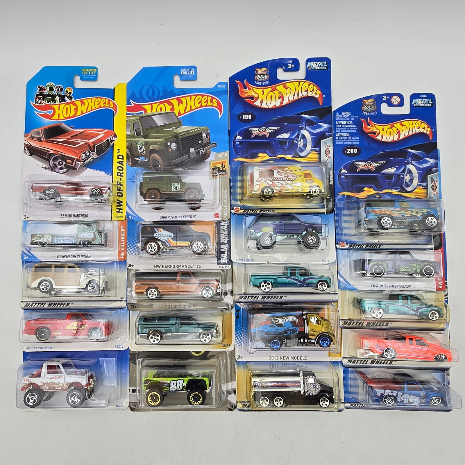 Lot Of 20 Hot Wheels Truck & Mixed Models: Lot of 20 Hot Wheels diecast vehicles featuring a mix of truck-heavy castings and utility-style models. Includes pickups, off-road trucks, vans, and service vehicles along with a few passenger and cus