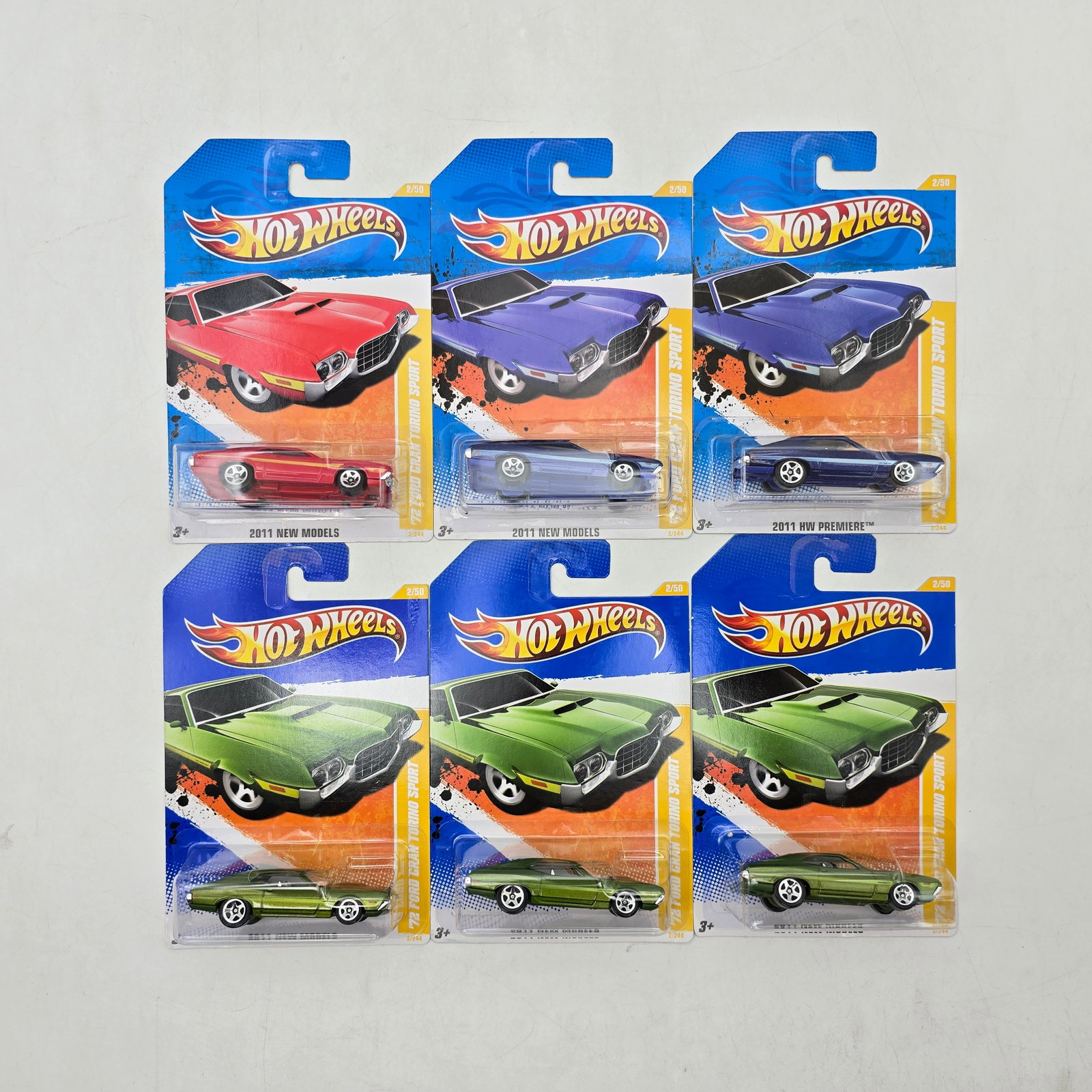 Lot of 6 Hot Wheels Torino Variations: Group of 6 Hot Wheels diecast Ford Torino castings from early 2010s releases, featuring multiple color and deco variations of the classic 1970s muscle car design. Includes duplicate castings in red, b