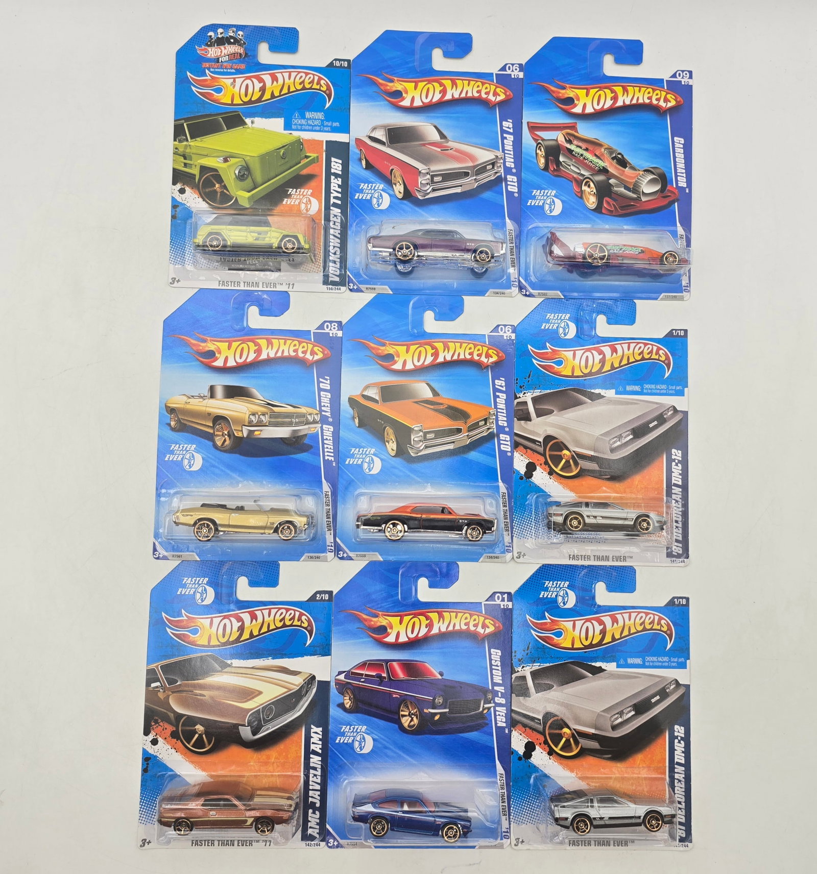 Lot of 9 Hot Wheels Faster Than Ever Models: Group of 9 Hot Wheels diecast vehicles from the Faster Than Ever series, featuring muscle cars, customs, fantasy racers, and performance-oriented castings from the late 2000s era. Includes multiple Fo