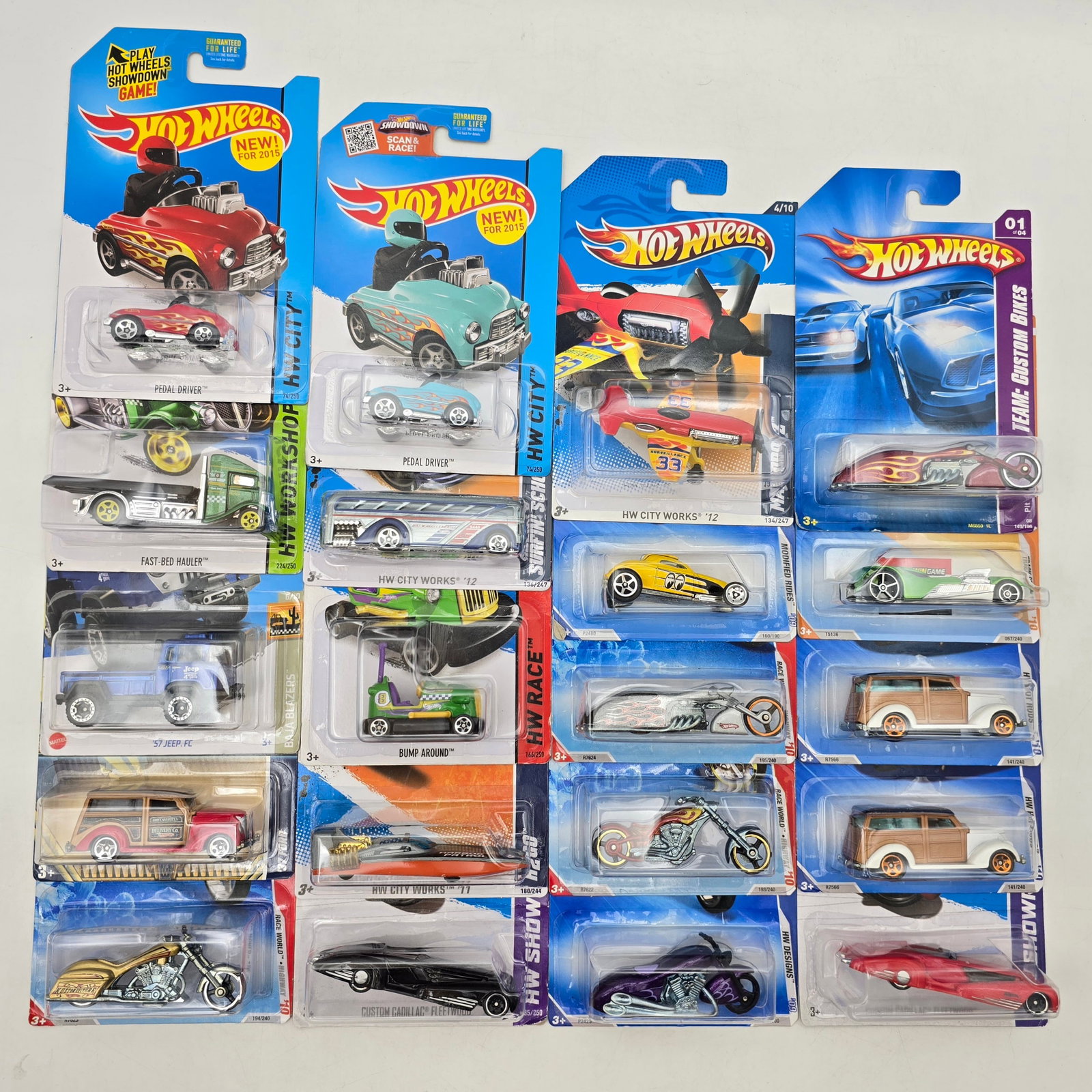 Lot of 20 Hot Wheels Fantasy & Custom Models: Group of 20 Hot Wheels diecast vehicles from early-to-mid 2010s releases, featuring a colorful mix of fantasy castings, custom cars, motorcycles, pedal cars, and stylized concept vehicles. Includes HW
