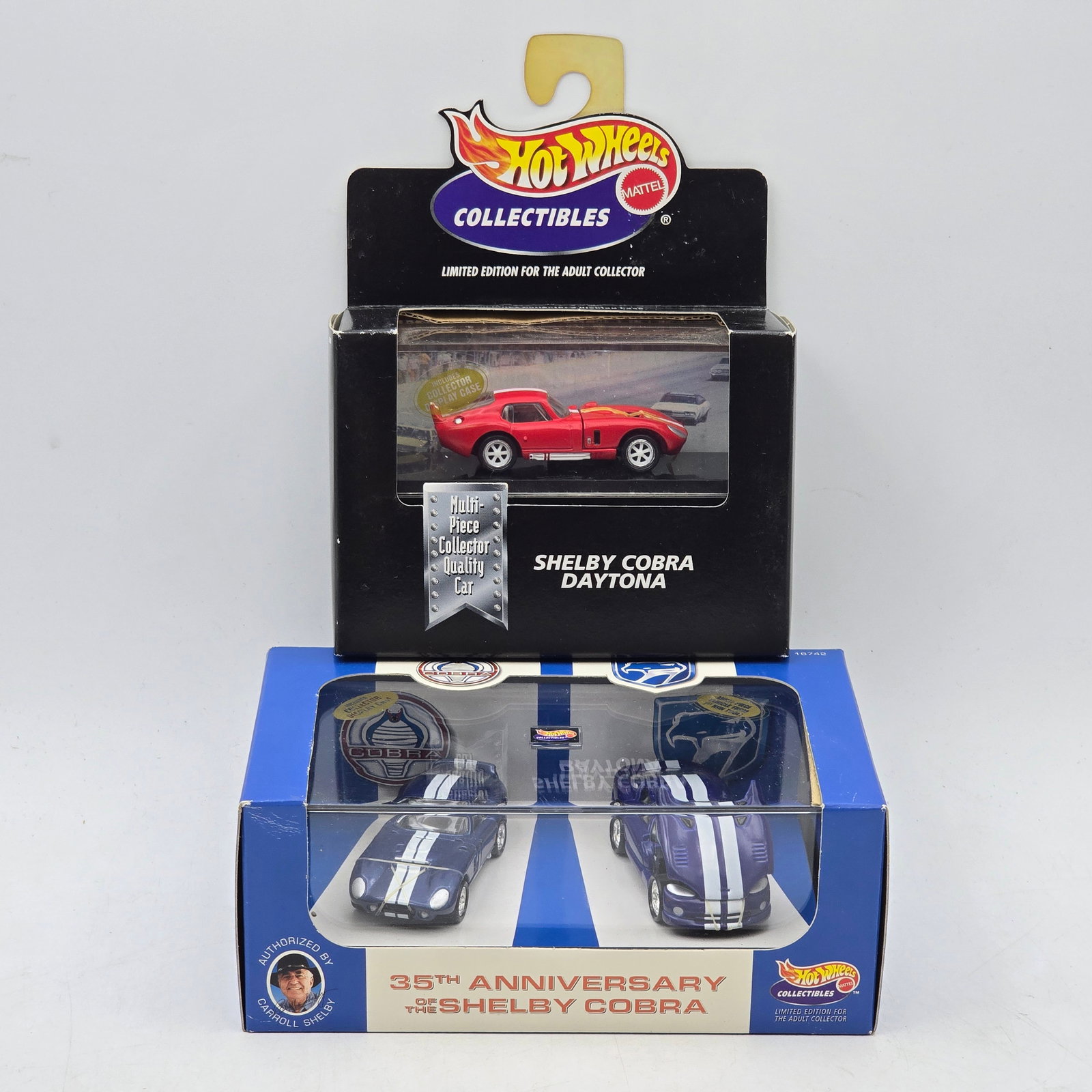 Pair of Hot Wheels Collectibles Shelby Sets: Pair of Hot Wheels Collectibles Shelby-themed releases featuring a Shelby Cobra Daytona collector model and a 35th Anniversary of the Shelby Cobra boxed set. These adult collector-oriented releases sh