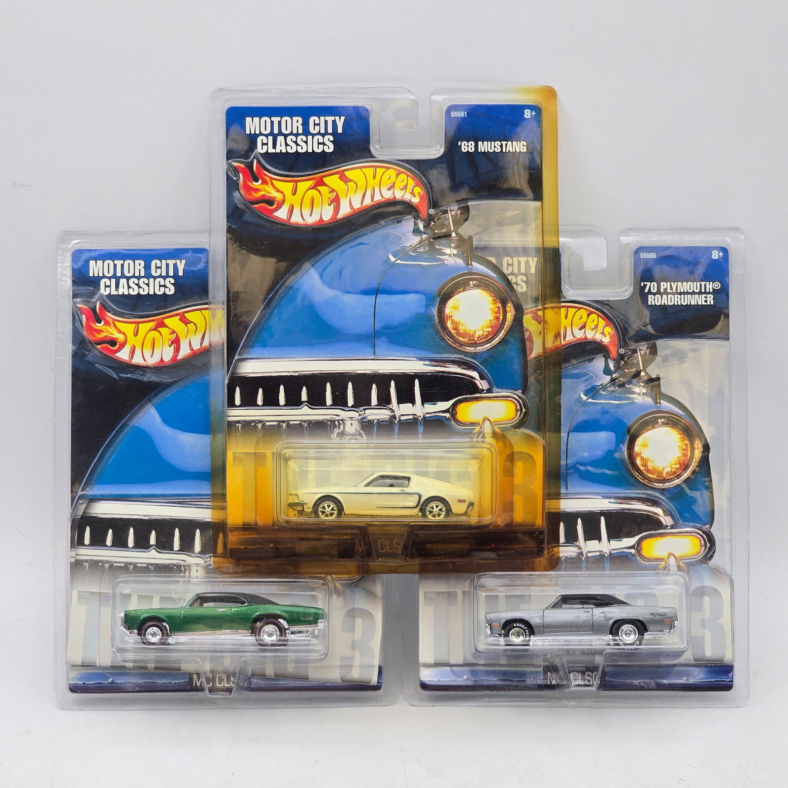 Lot of 3 Hot Wheels Motor City Classics Models: Group of 3 Hot Wheels Motor City Classics premium releases featuring classic American muscle car castings including a â€™68 Mustang and 2 variations on the â€™70 Plymouth Road Runner. 