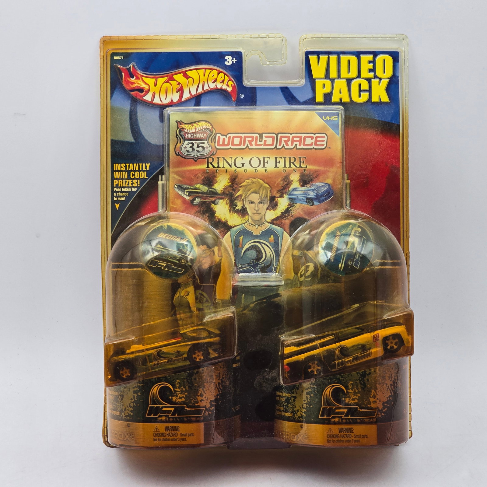 Hot Wheels Highway 35 World Race Video Pack 2-Pack: Hot Wheels Highway 35 World Race Video Pack release featuring a pair of themed World Race vehicles packaged alongside the â€?Ring of Fireâ€? Episode One VHS release, produced circa 2003. T