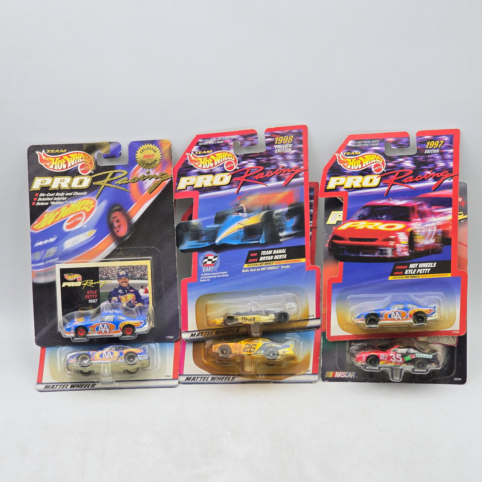 Lot of 6 Hot Wheels Pro Racing NASCAR: Group of 6 Hot Wheels Pro Racing NASCAR releases, produced circa 1997â€“1998. This assortment includes a mix of NASCAR stock cars and open-wheel racing models featuring drivers and teams such 