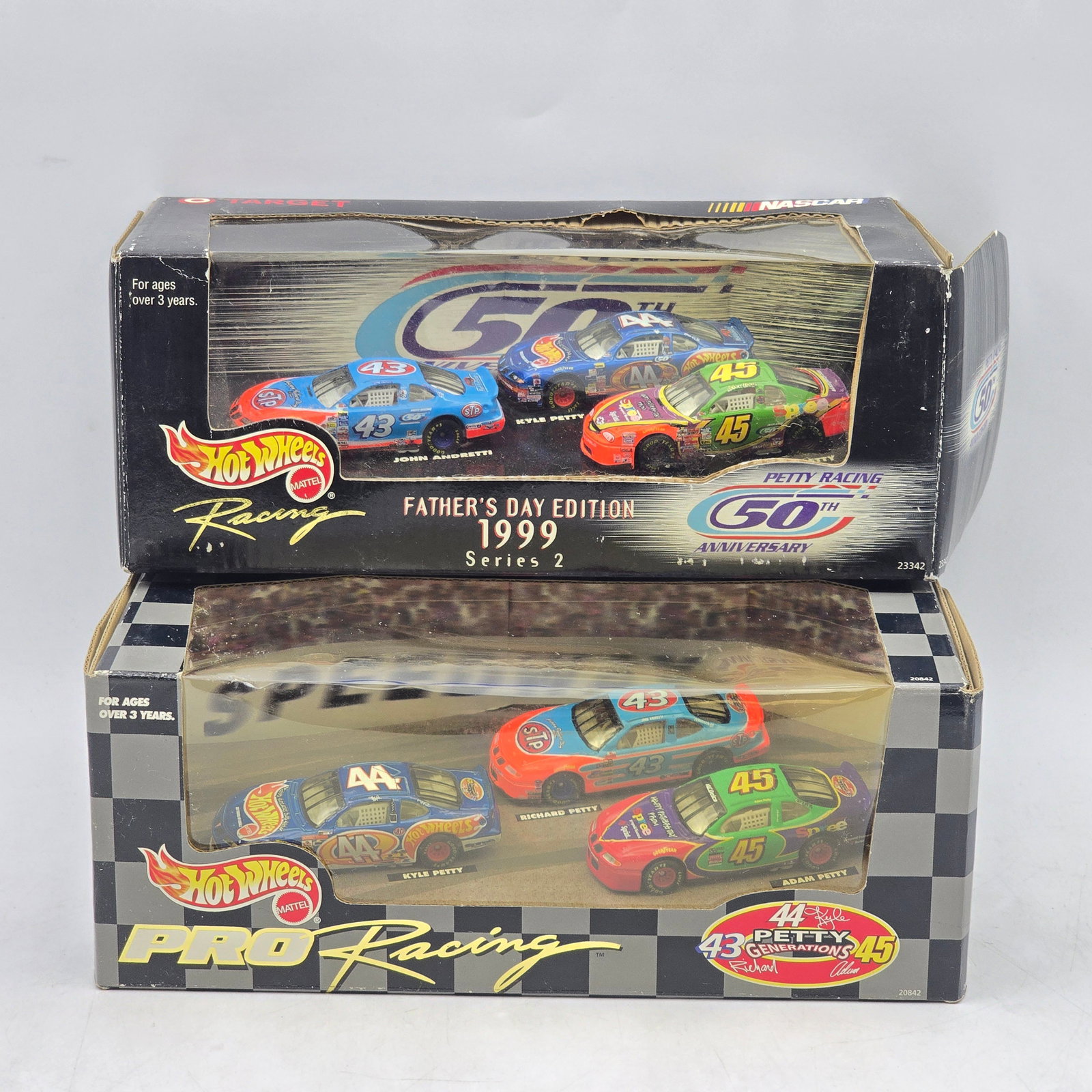 Pair of Hot Wheels Pro Racing NASCAR Sets: Pair of Hot Wheels Pro Racing NASCAR boxed sets, produced circa 1999. This assortment includes a Fatherâ€™s Day Edition 1999 Series 2 release along with a Petty Racing family-themed set featur