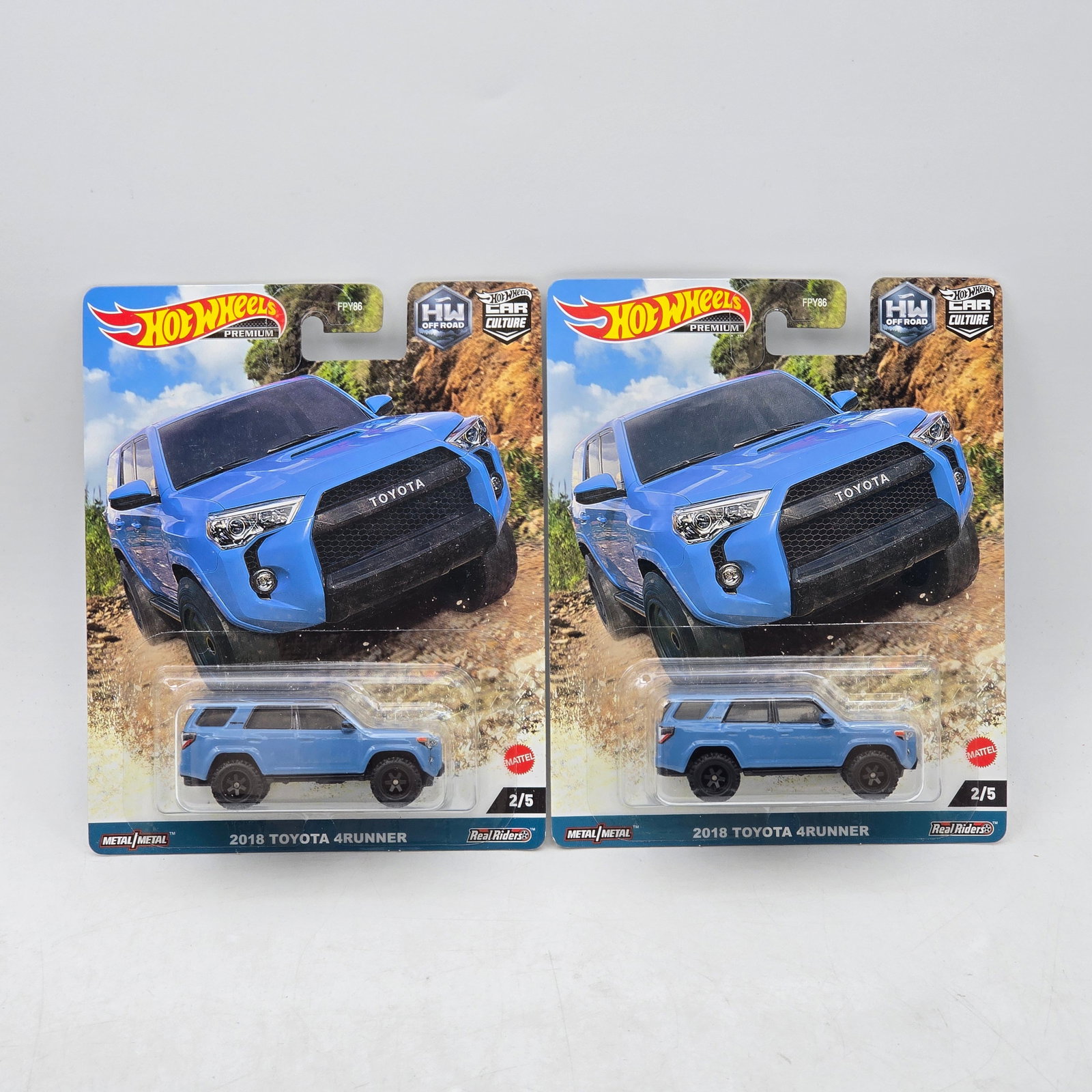 Pair of Hot Wheels Toyota 4Runners: Includes (2) 2018 Toyota 4Runner premium models from the Car Culture HW Off Road series. Cars-Appear to be in good condition with clean paint, sharp tampo detail, and no obvious wear visible. Cards-Sh