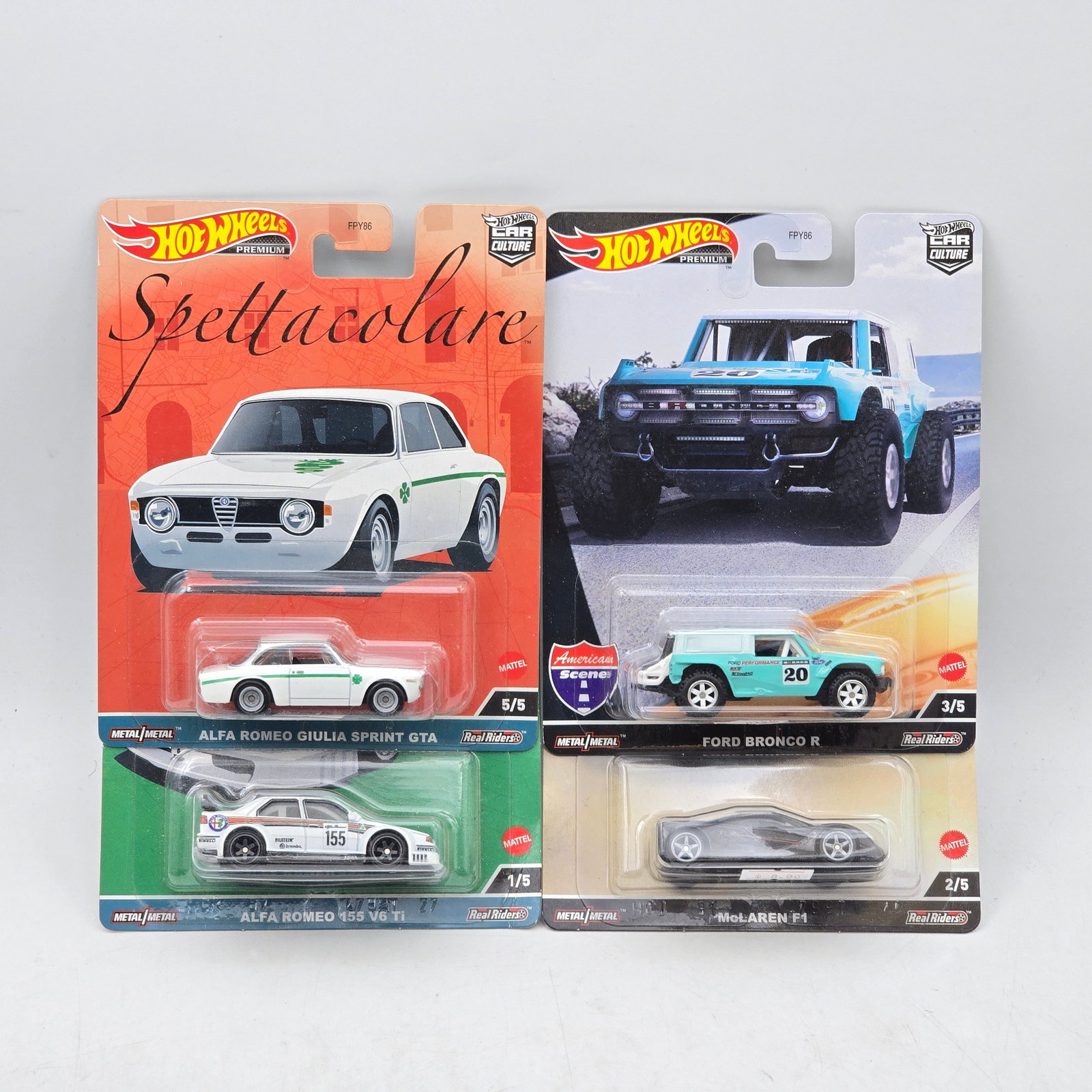 Lot of 4 Hot Wheels Premium Models: Includes Alfa Romeo Giulia Sprint GTA, Alfa Romeo 155 V6 TI, Ford Bronco R, and McLaren F1 premium models from the Car Culture Spettacolare and American Scene series. Cars-Look to be in good