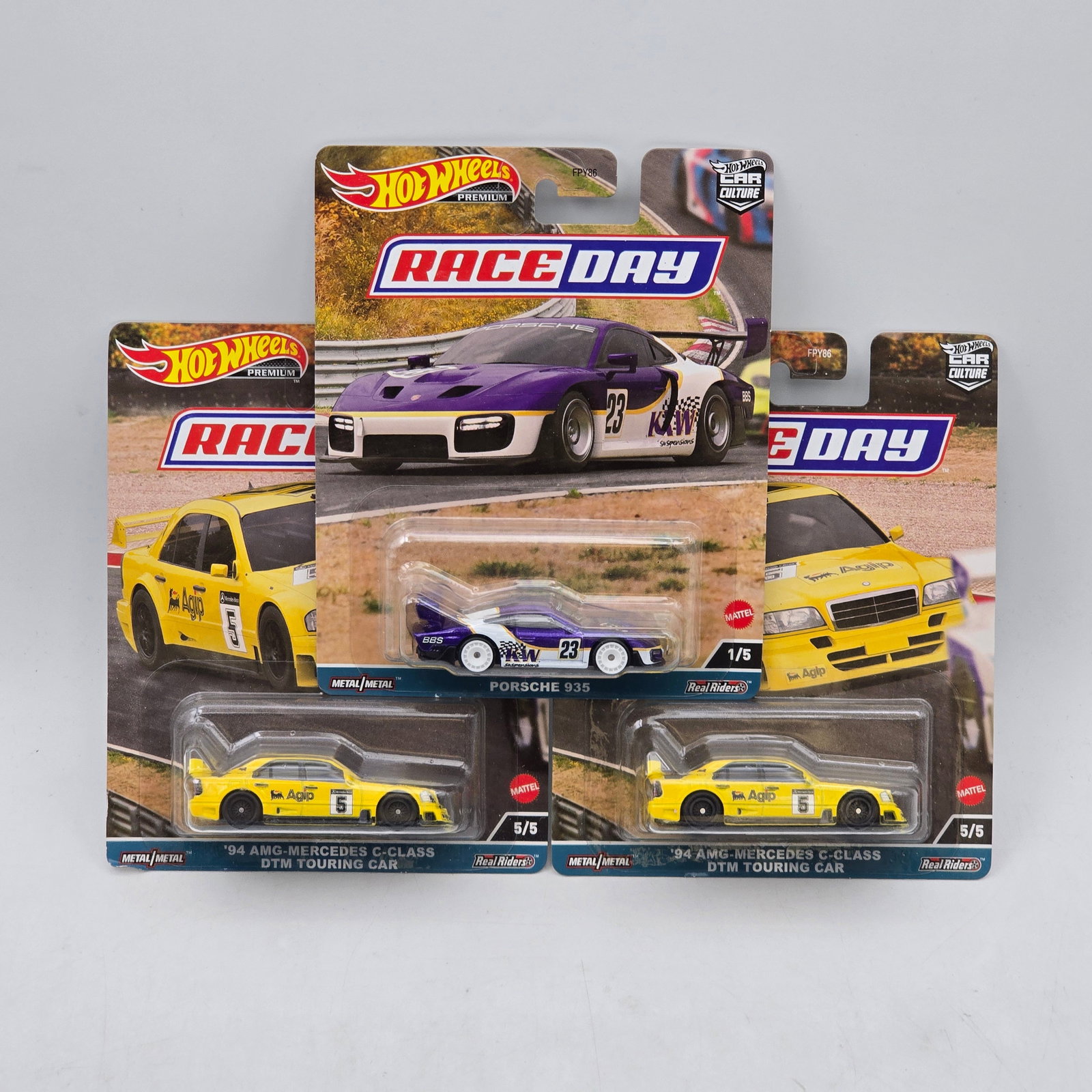 Lot of 3 Hot Wheels Race Day Premiums: Includes (2) â€™94 AMG-Mercedes C-Class DTM Touring Car and (1) Porsche 935 premium models from the Car Culture Race Day series. Cars-Appear to be in good condition with clean paint, sharp