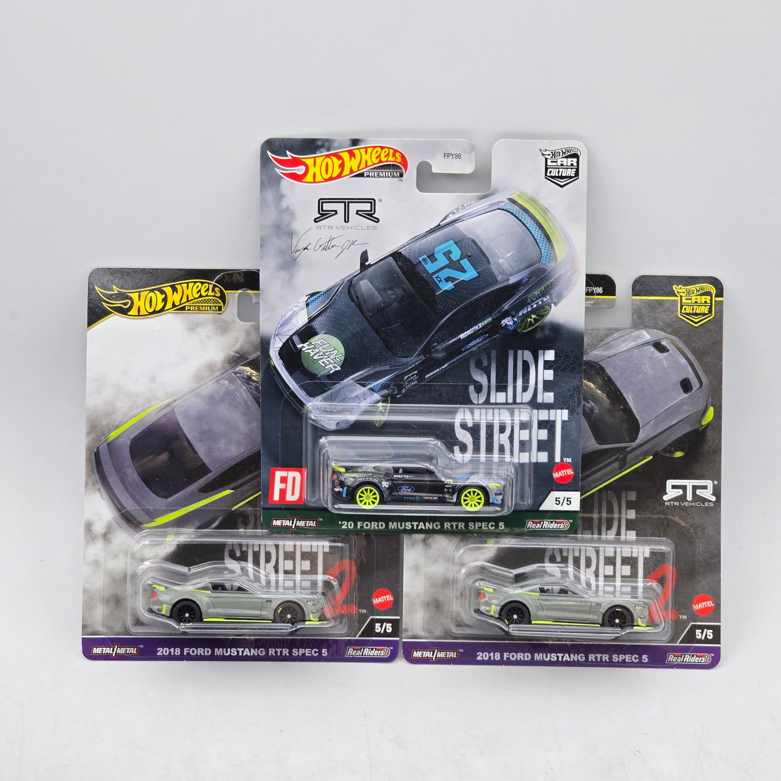 Lot of 3 Hot Wheels Slide Street Premiums: Includes (2) 2018 Ford Mustang RTR Spec 5 and (1) â€™20 Ford Mustang RTR Spec 5 premium models from the Car Culture Slide Street series. Cars-Look to be in good condition with no notable wear 