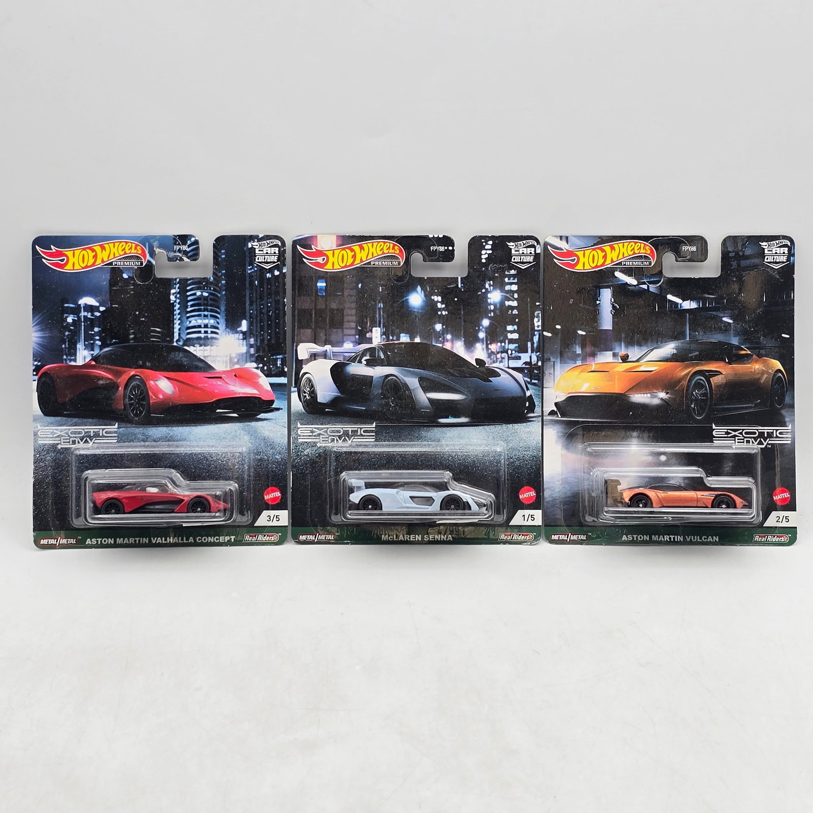 Lot of 3 Hot Wheels Exotic Envy Premiums: Includes Aston Martin Valhalla Concept, McLaren Senna, and Aston Martin Vulcan premium models from the Car Culture Exotic Envy series. Cars-Appear to be in good condition with clean paint, sharp tampo